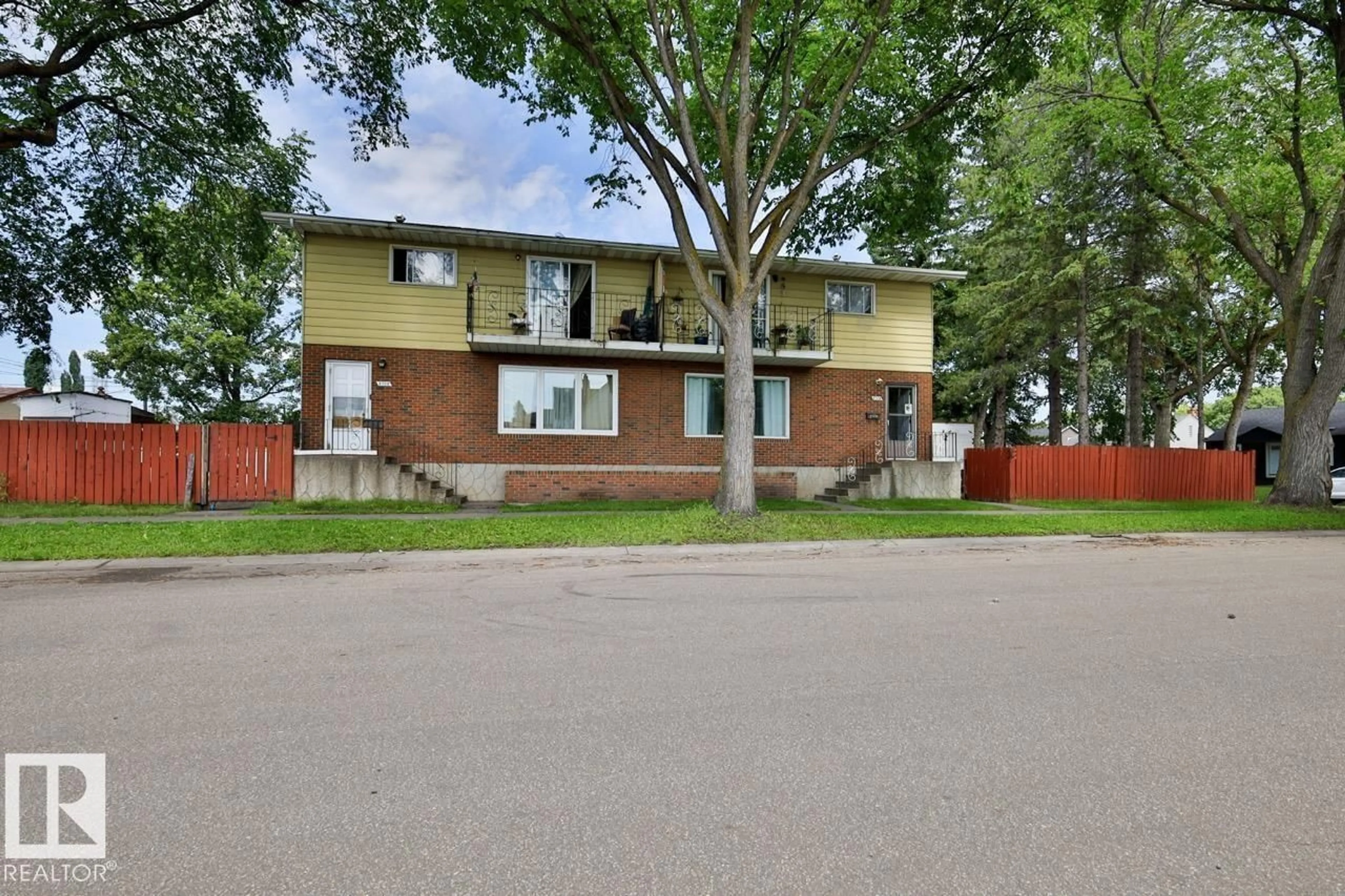 Home with brick exterior material, street for NW NW - 8704 8708 117 AV, Edmonton Alberta T5B4M1