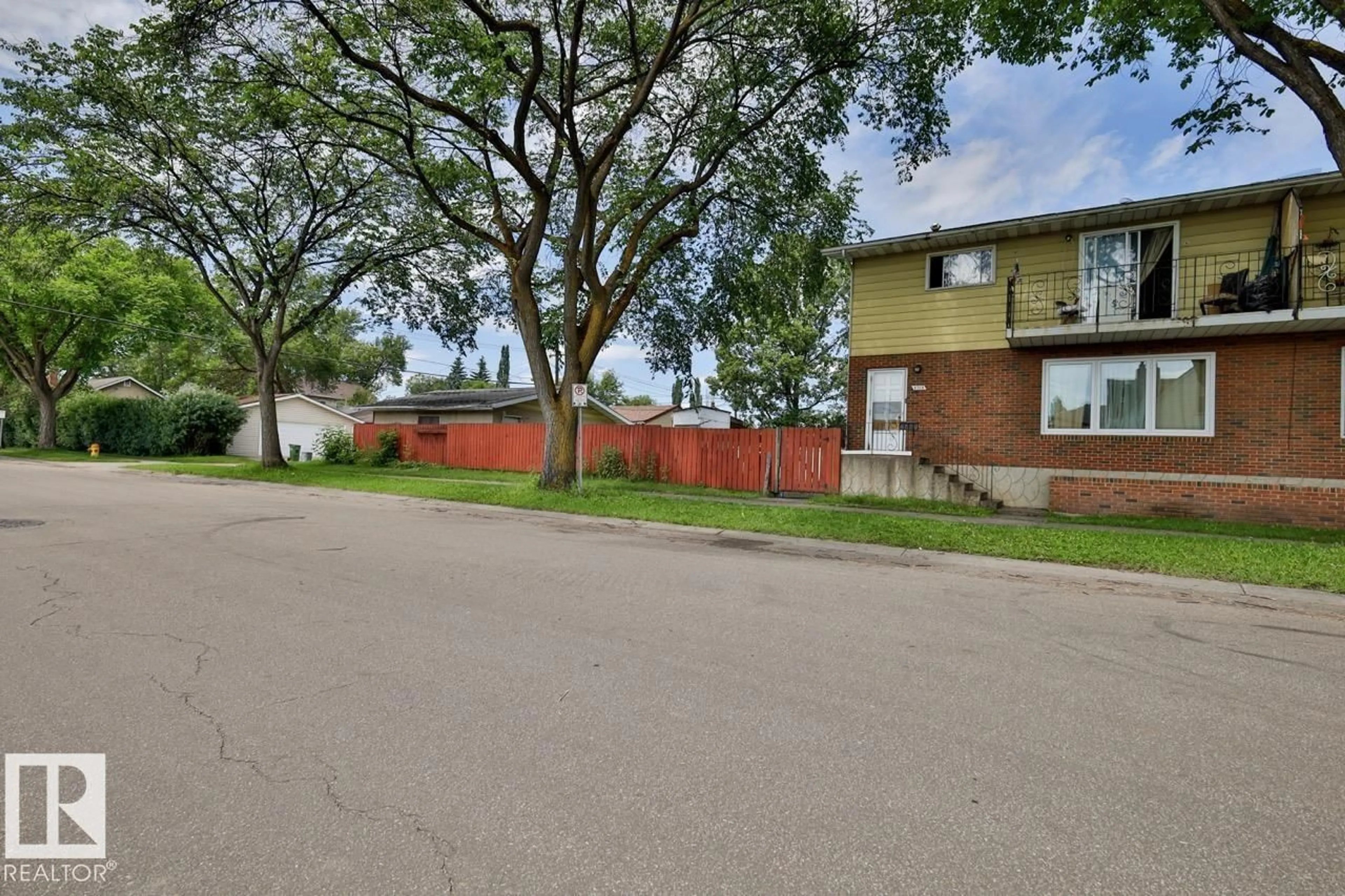 A pic from outside/outdoor area/front of a property/back of a property/a pic from drone, street for NW NW - 8704 8708 117 AV, Edmonton Alberta T5B4M1