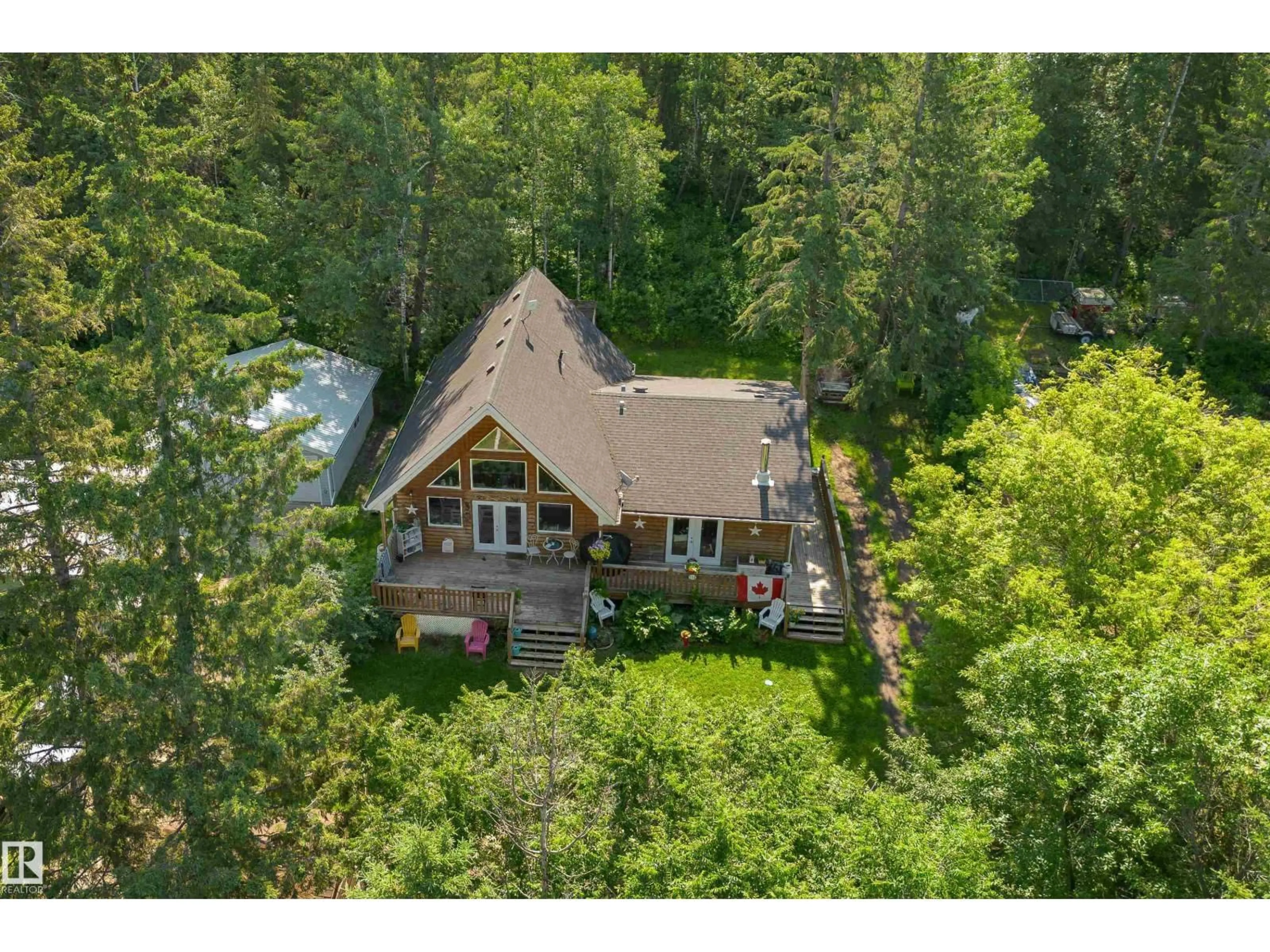 A pic from outside/outdoor area/front of a property/back of a property/a pic from drone, unknown for 130 LAKESHORE DR, Rural Lac Ste. Anne County Alberta T0E1V0