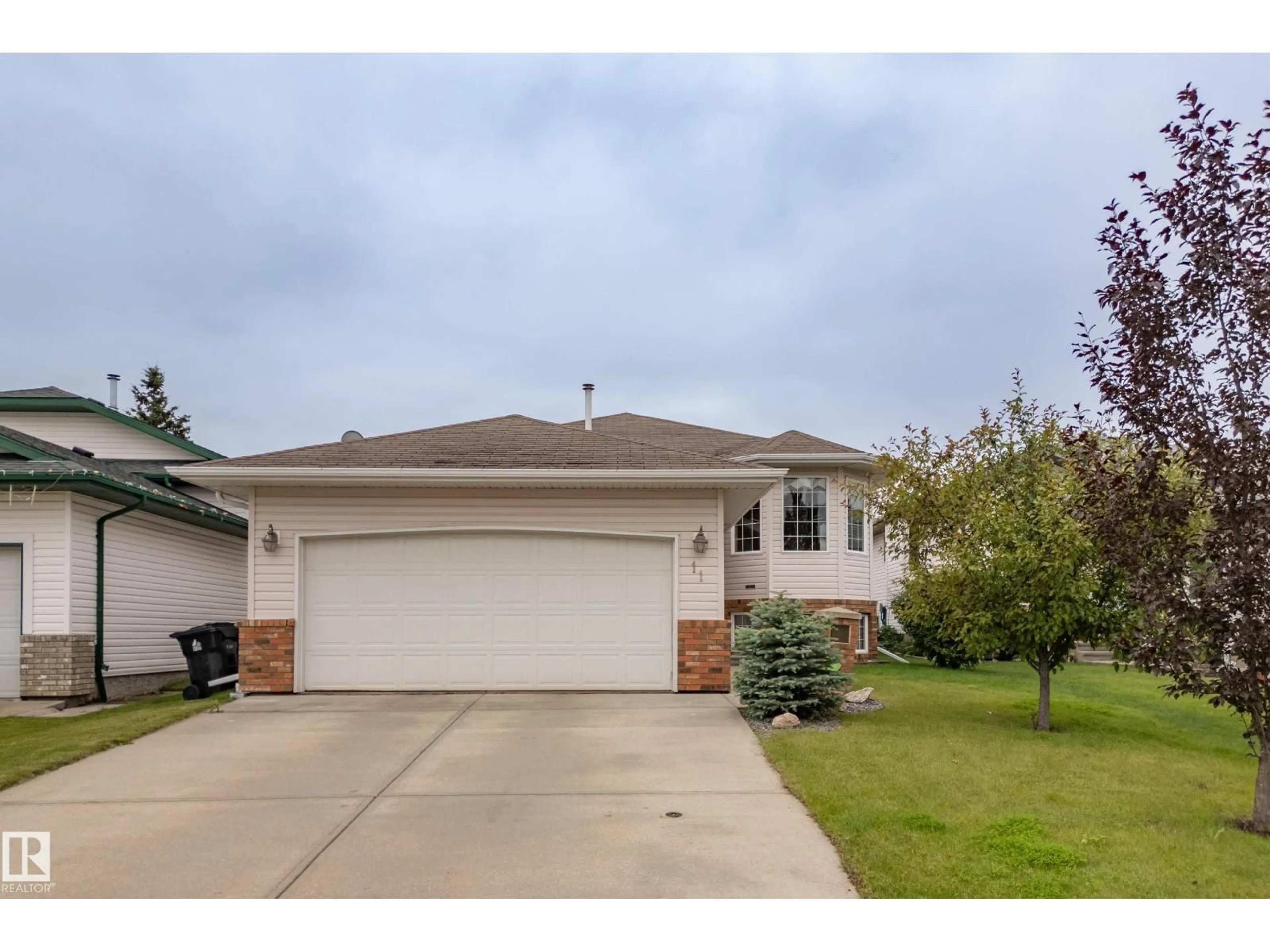 Home with vinyl exterior material, street for 11 HAGEN CO, Spruce Grove Alberta T7X2W1