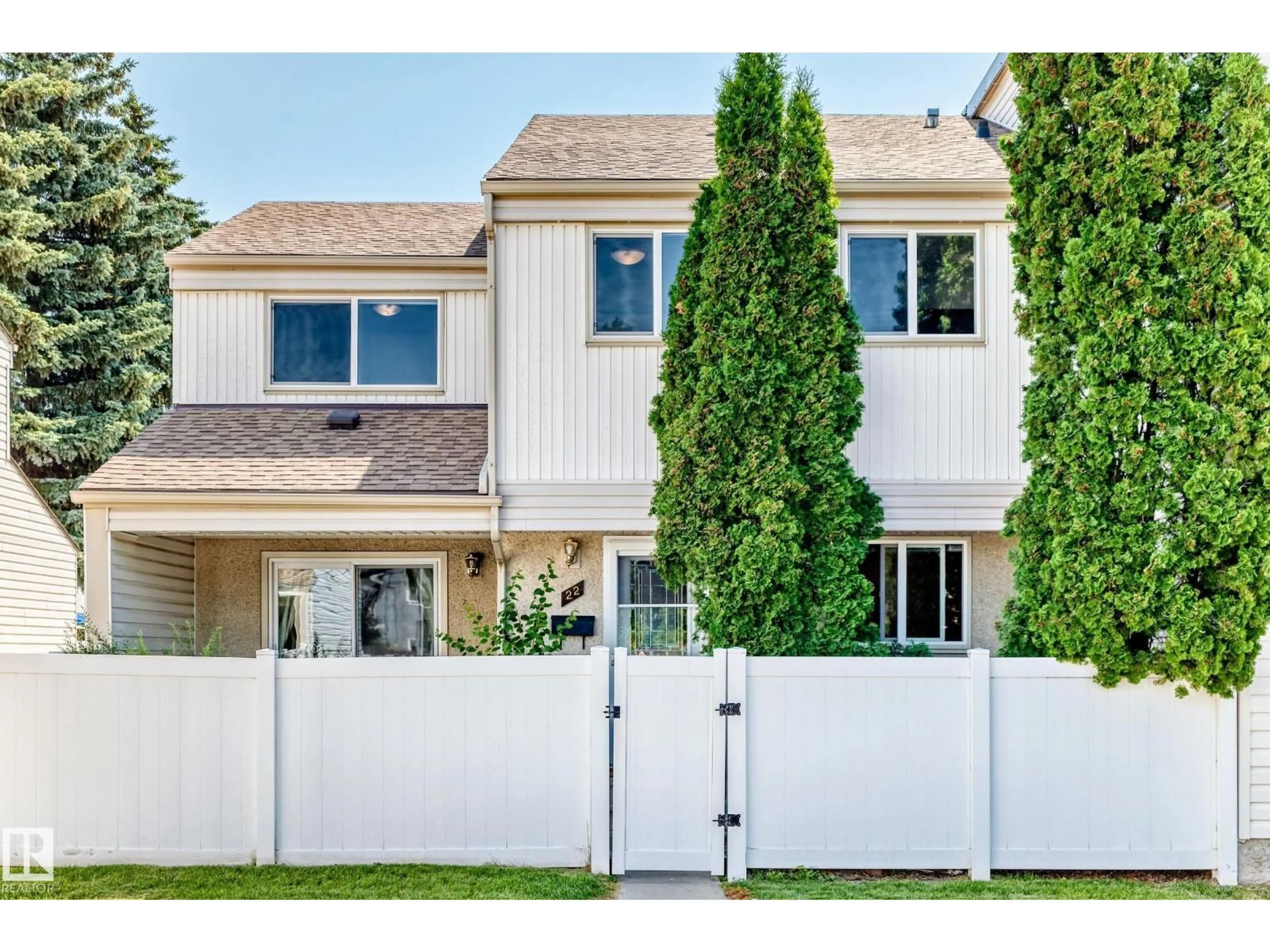 Home with vinyl exterior material, street for 22 WOODVALE VG, Edmonton Alberta T6L1W4