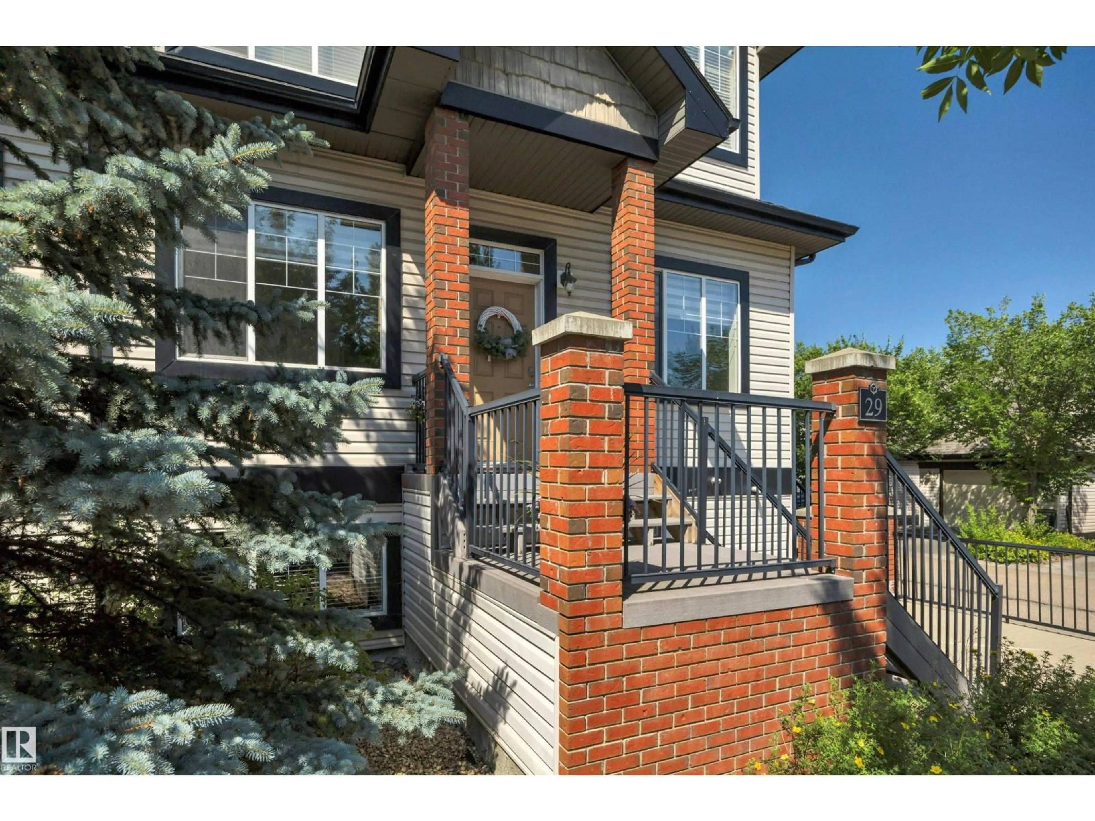 Home with brick exterior material, street for 4821 - 29 TERWILLEGAR CM NW, Edmonton Alberta T6R0C5