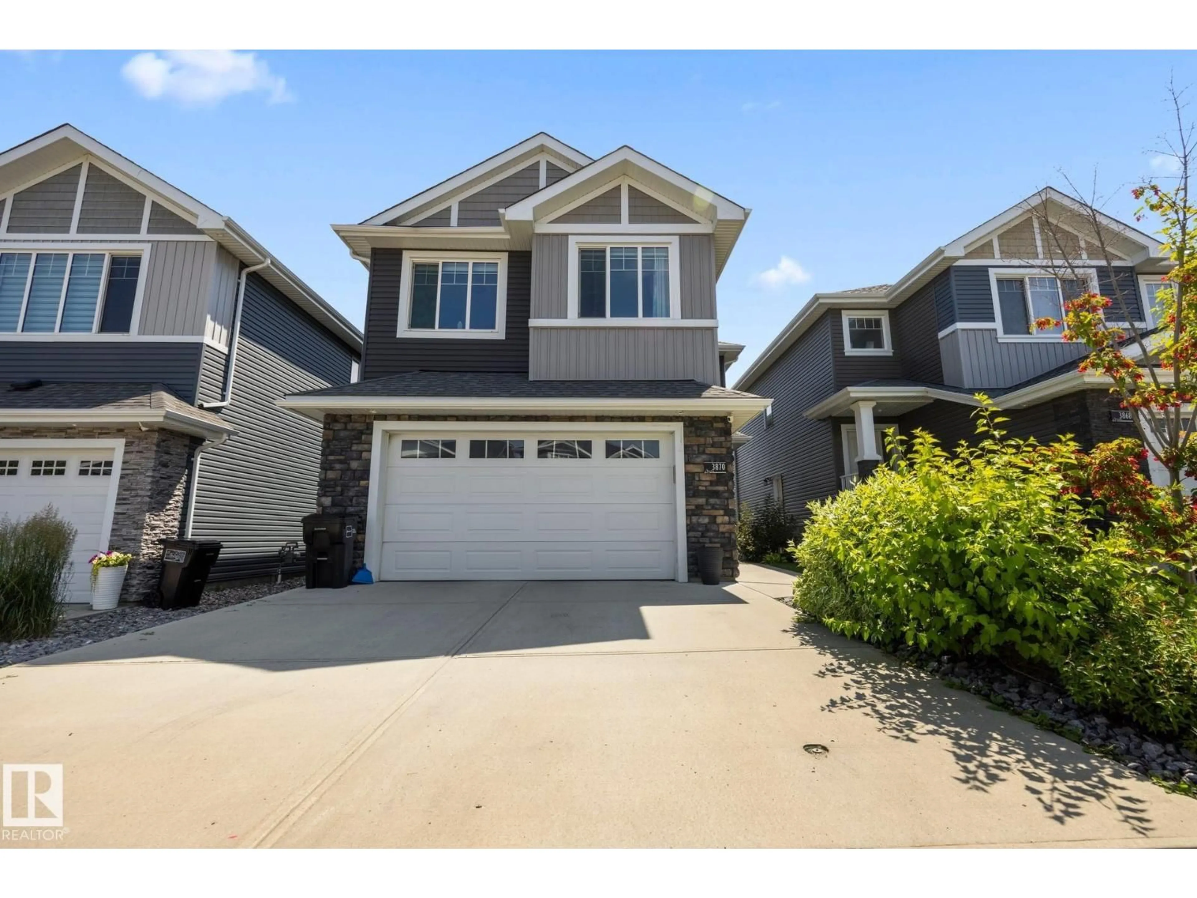 Home with vinyl exterior material, street for 3870 ROBINS CR, Edmonton Alberta T5S0M8