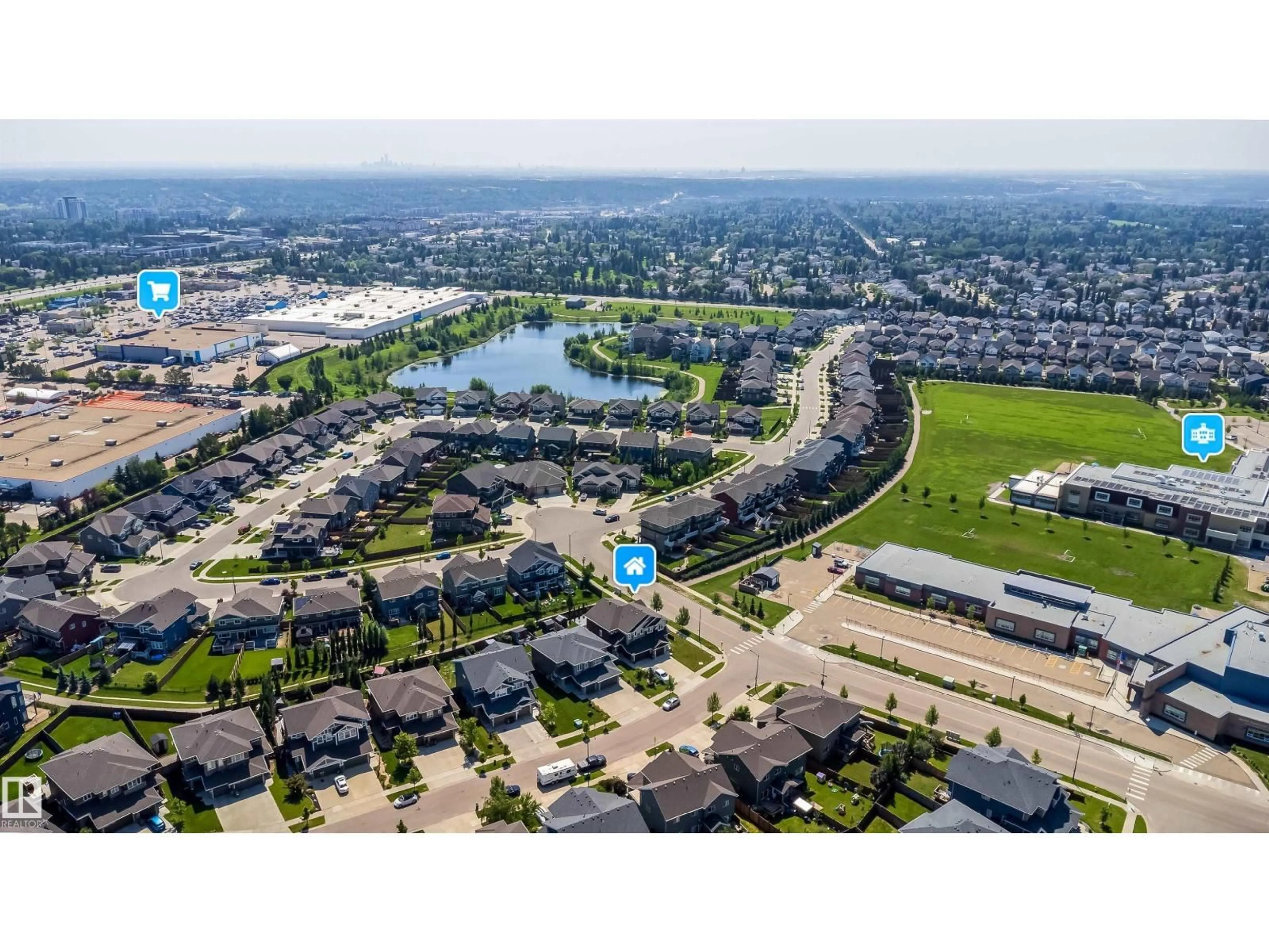 A pic from outside/outdoor area/front of a property/back of a property/a pic from drone, water/lake/river/ocean view for 114 JAMES CR, St. Albert Alberta T8N7S6