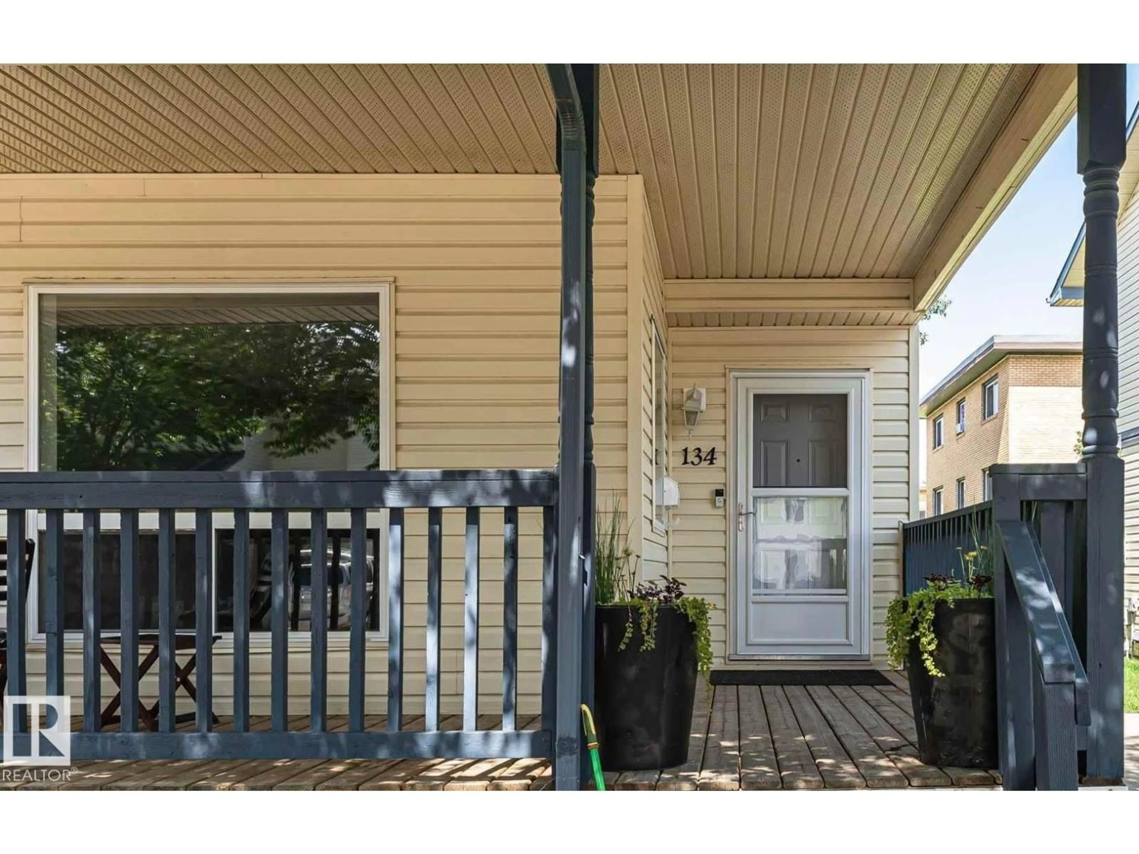 Home with vinyl exterior material, street for #134 - 10909 106 ST, Edmonton Alberta T5H4M7