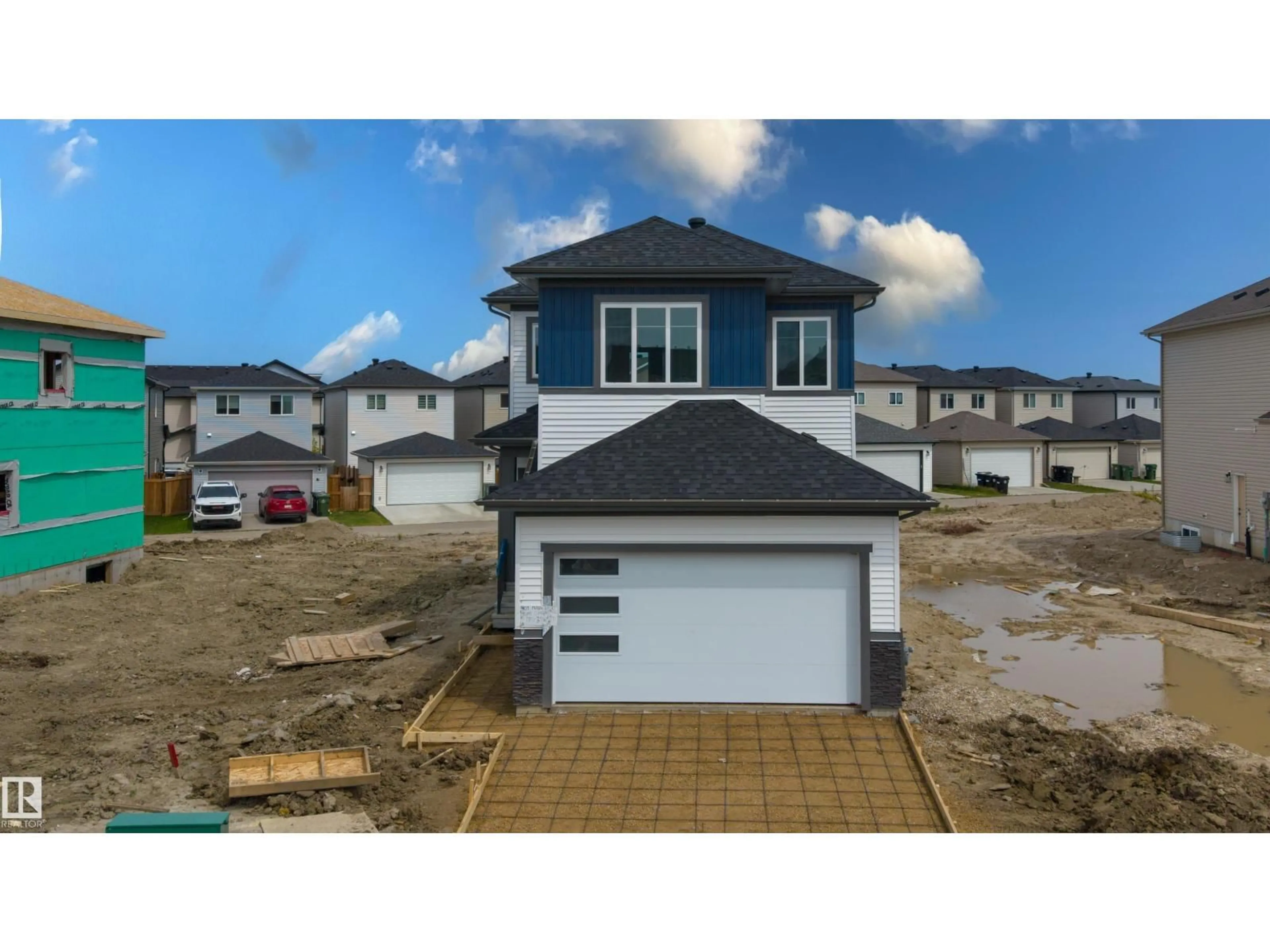 A pic from outside/outdoor area/front of a property/back of a property/a pic from drone, street for 409 MUNN, Leduc Alberta T9E0J9