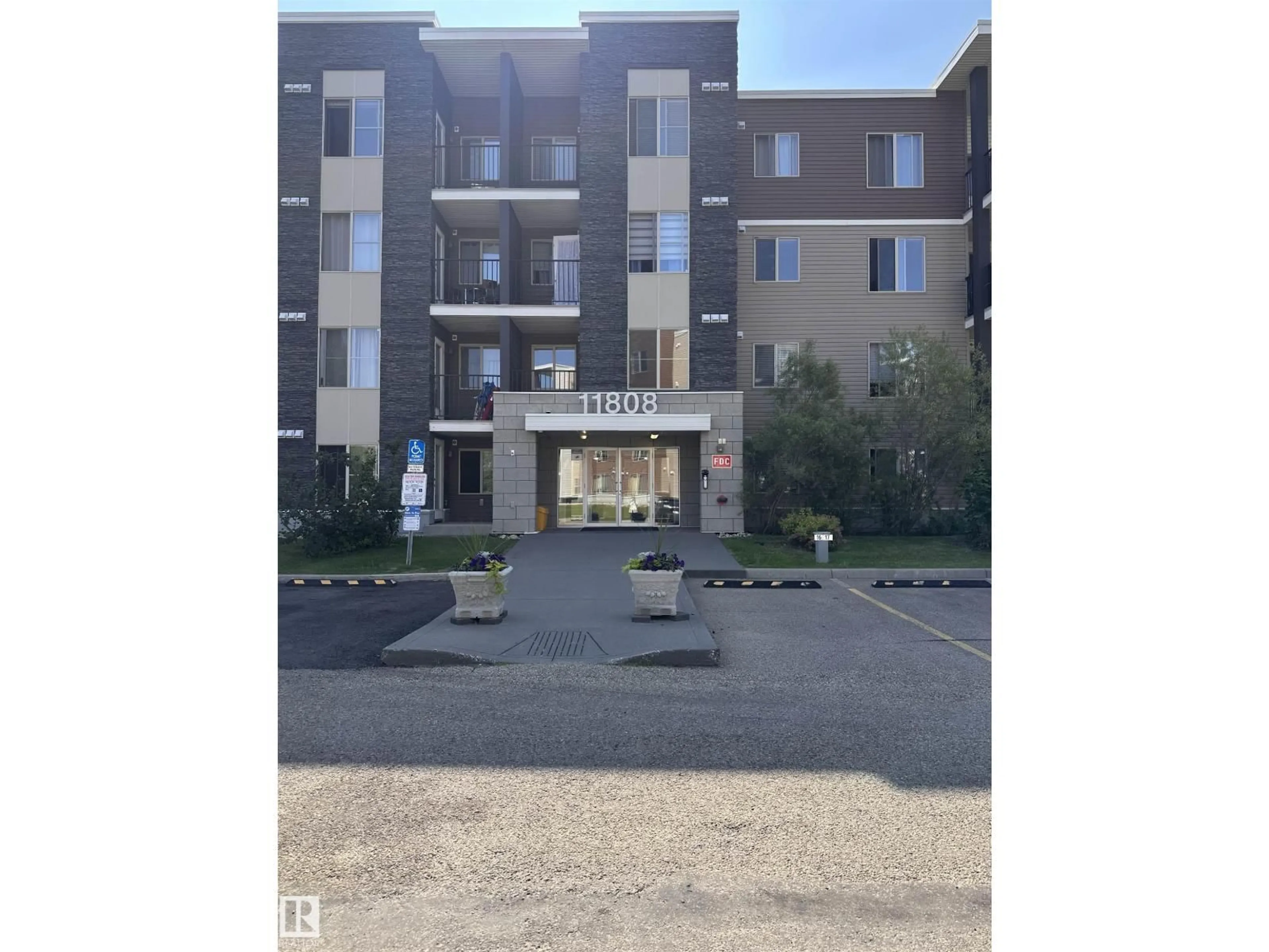 A pic from outside/outdoor area/front of a property/back of a property/a pic from drone, building for #419 - 11808 22 AV SW, Edmonton Alberta T6W2A2