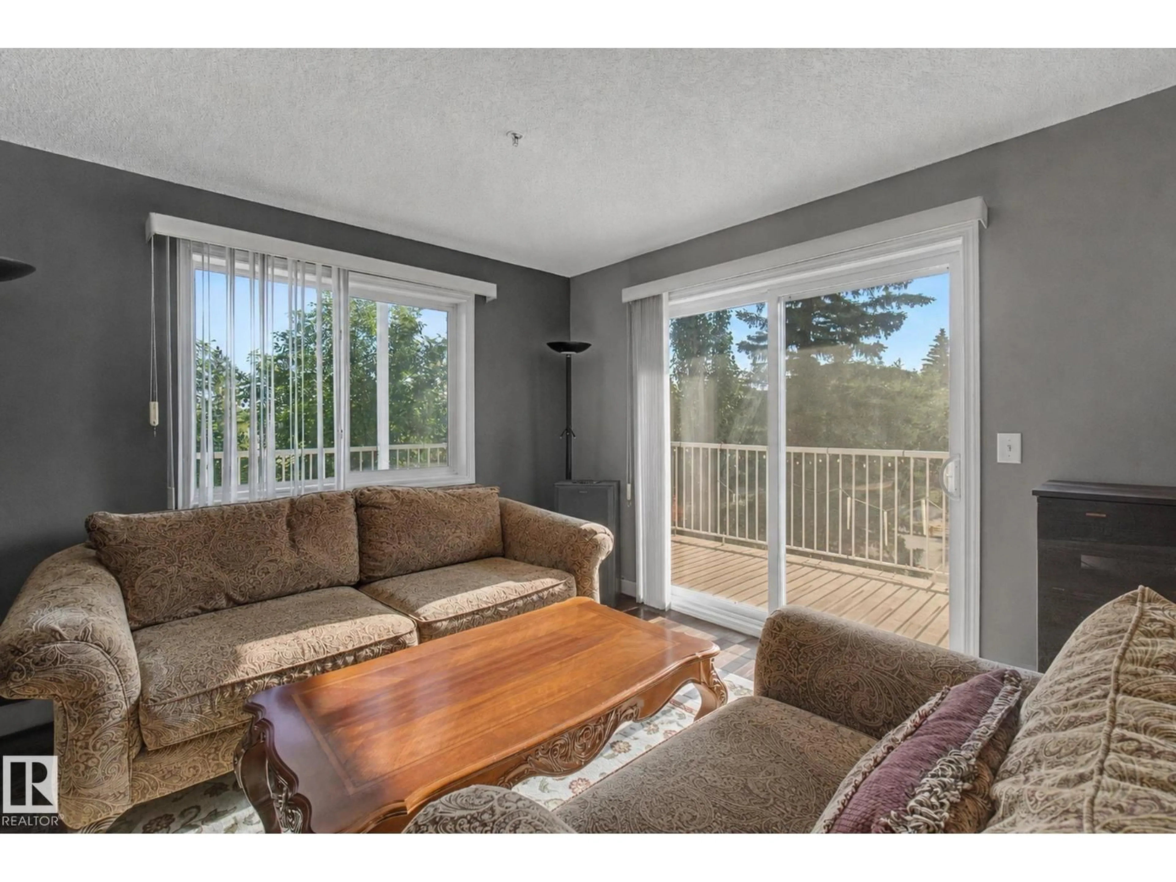 Living room with furniture, wood/laminate floor for #311 - 7511 171 ST, Edmonton Alberta T5T6S7