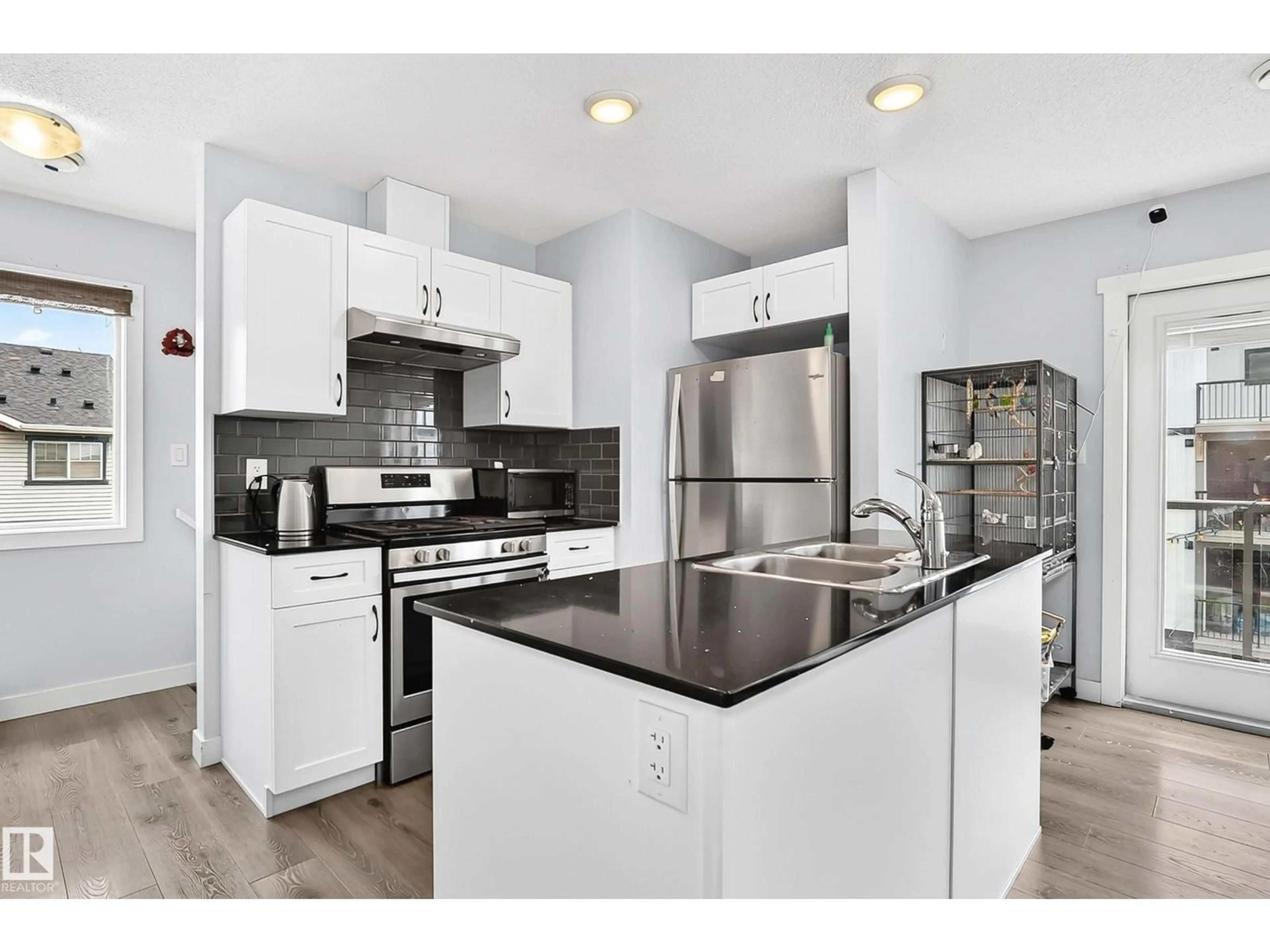 Open concept kitchen, unknown for 72 - 1530 TAMARACK BV, Edmonton Alberta T6T2E6
