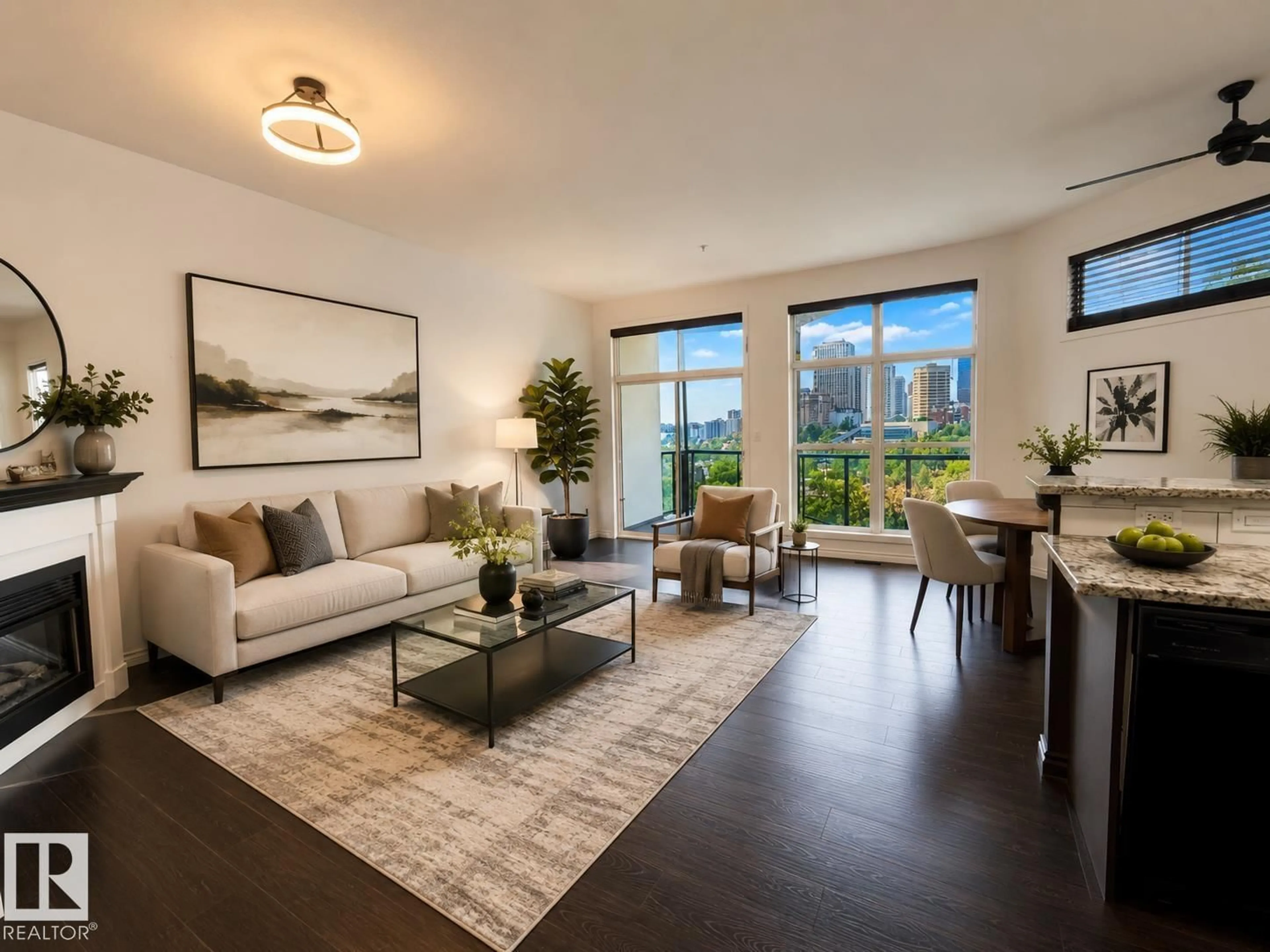Living room with furniture, wood/laminate floor for #412 - 9503 101 AV NW, Edmonton Alberta T5H4R1