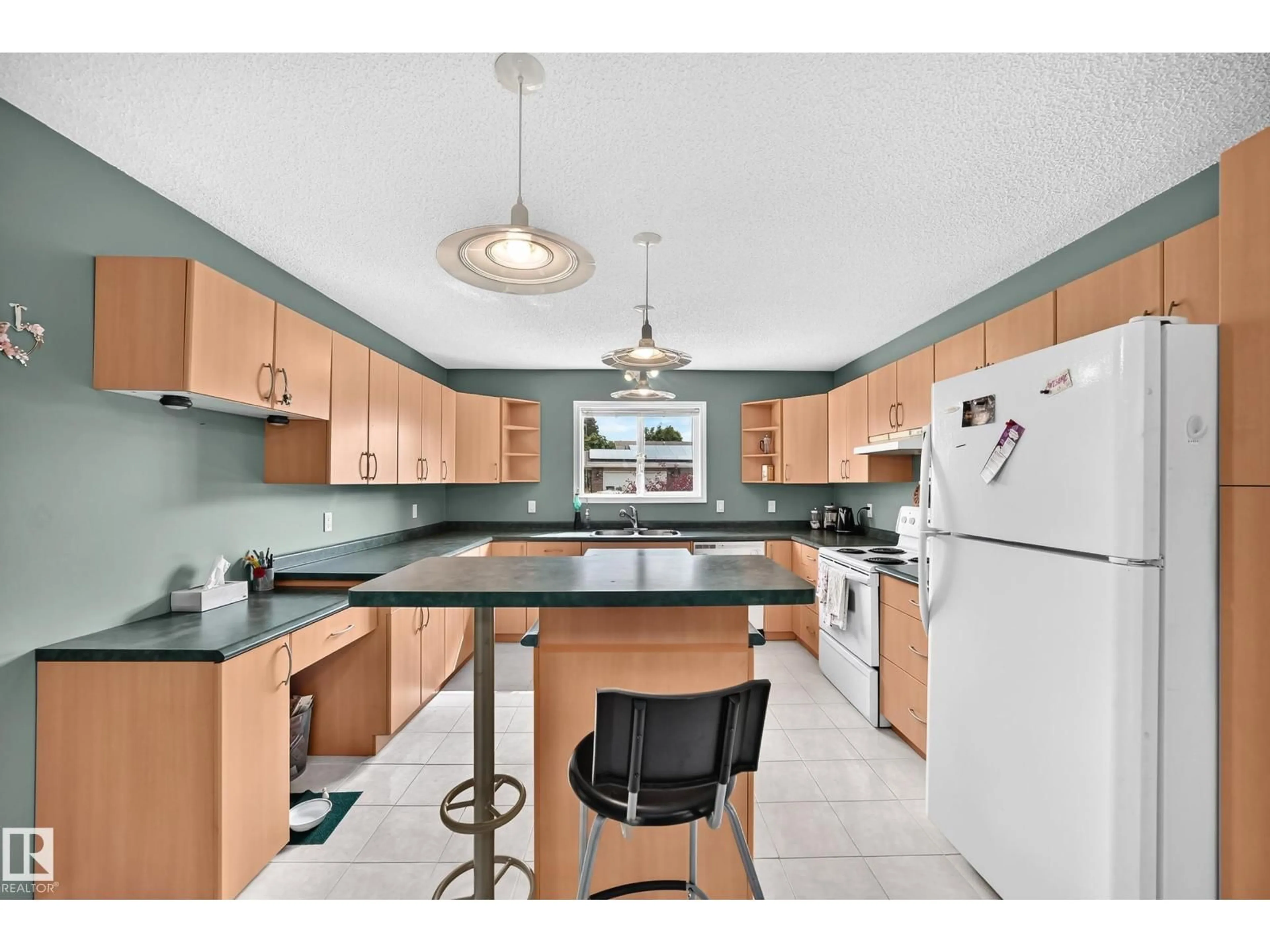 Open concept kitchen, ceramic/tile floor for NW - 1116 39 ST, Edmonton Alberta T6L2K7