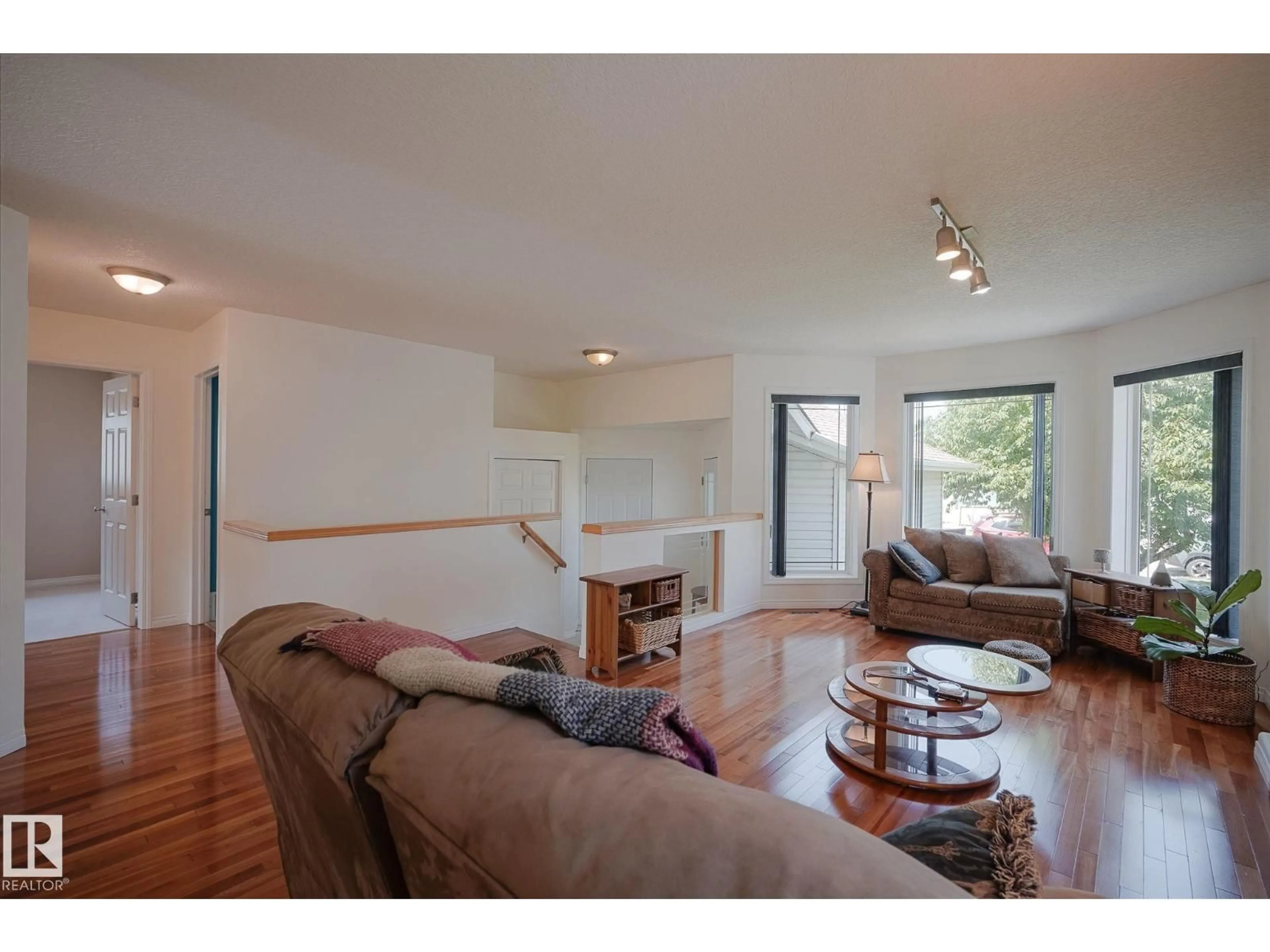 Living room with furniture, wood/laminate floor for 189 FORREST DR, Sherwood Park Alberta T8A6A9