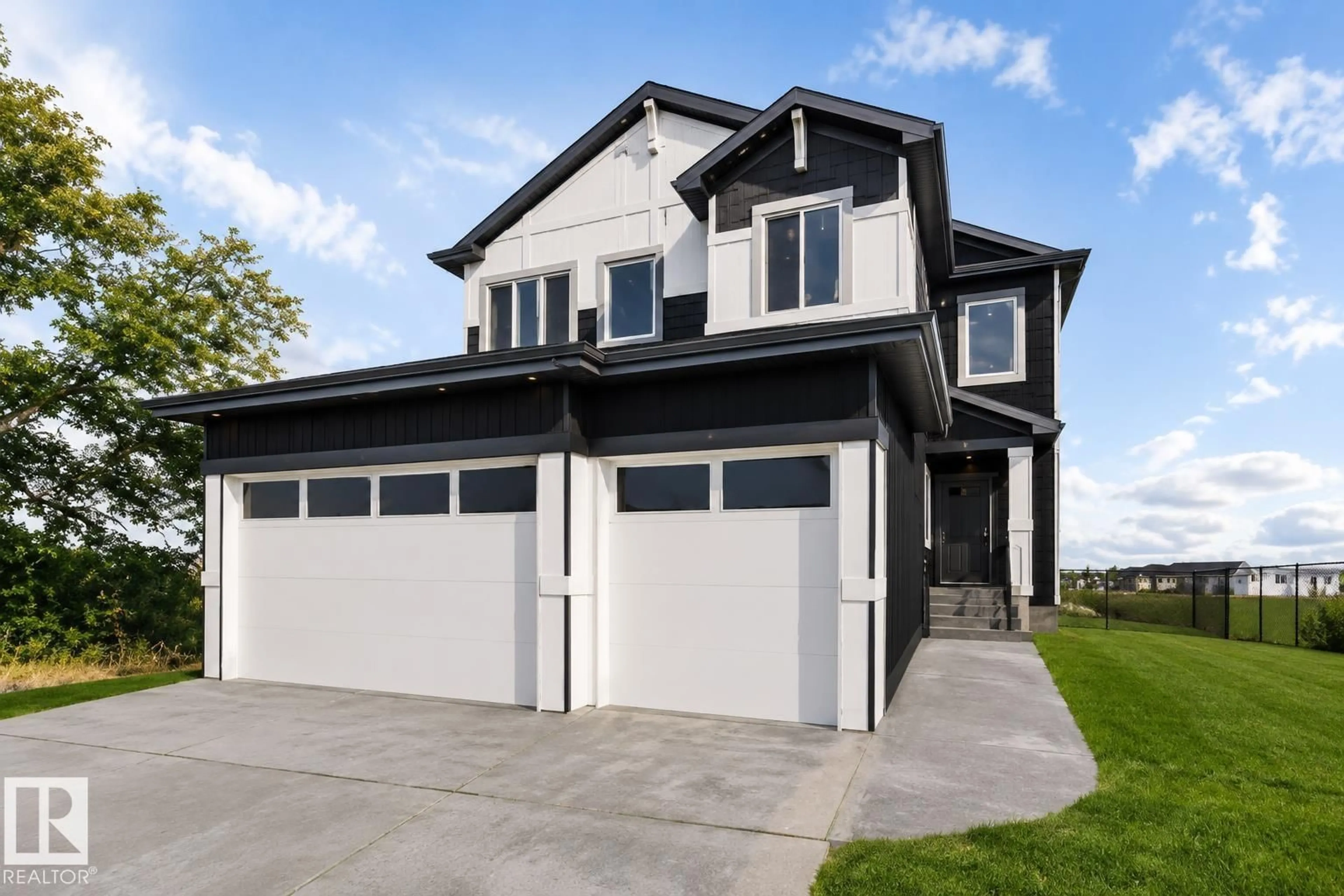 Home with vinyl exterior material, street for 88 SILVERSTONE DR, Stony Plain Alberta T7Z0E8