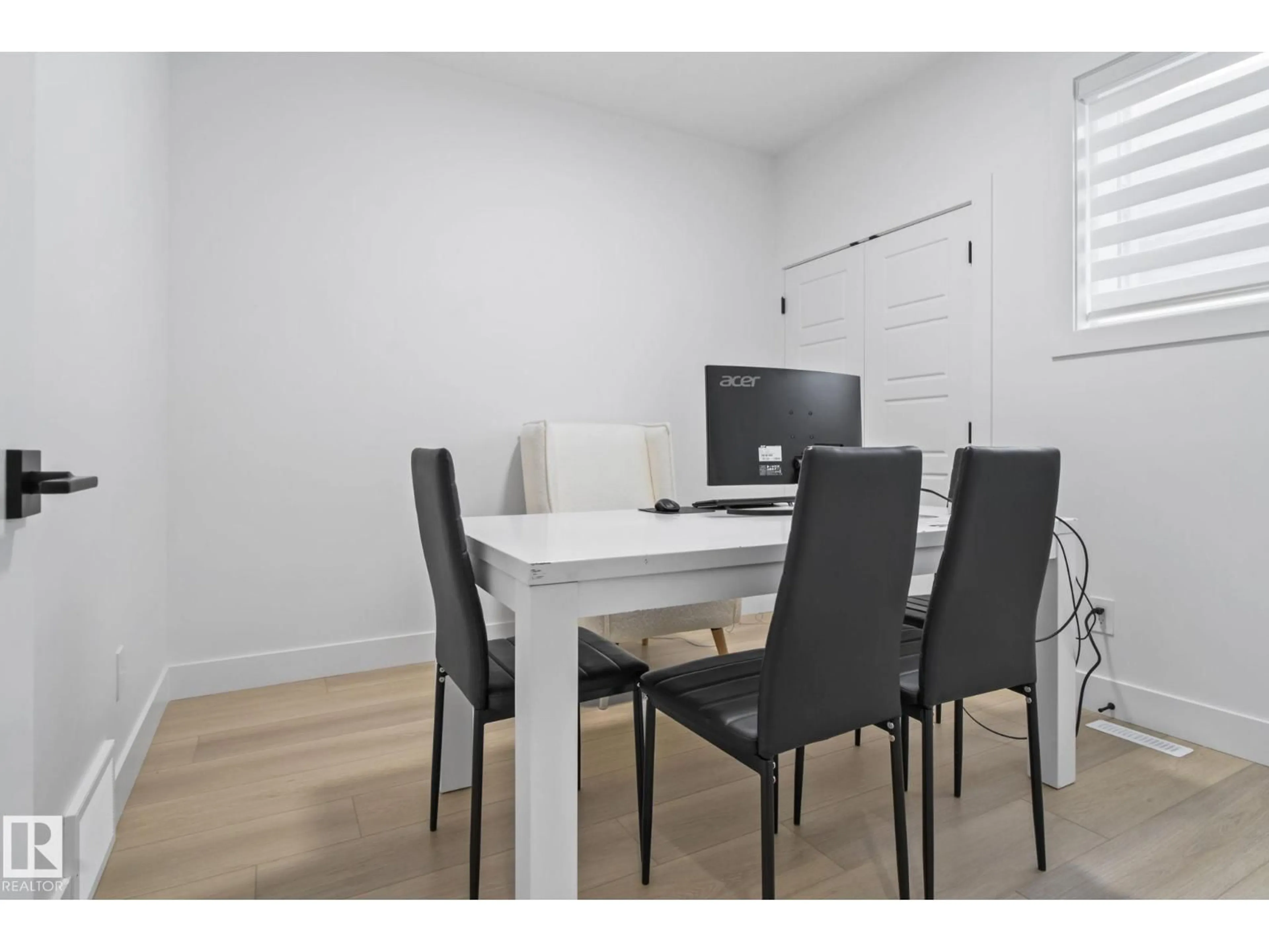 Dining room, wood/laminate floor for 88 SILVERSTONE DR, Stony Plain Alberta T7Z0E8