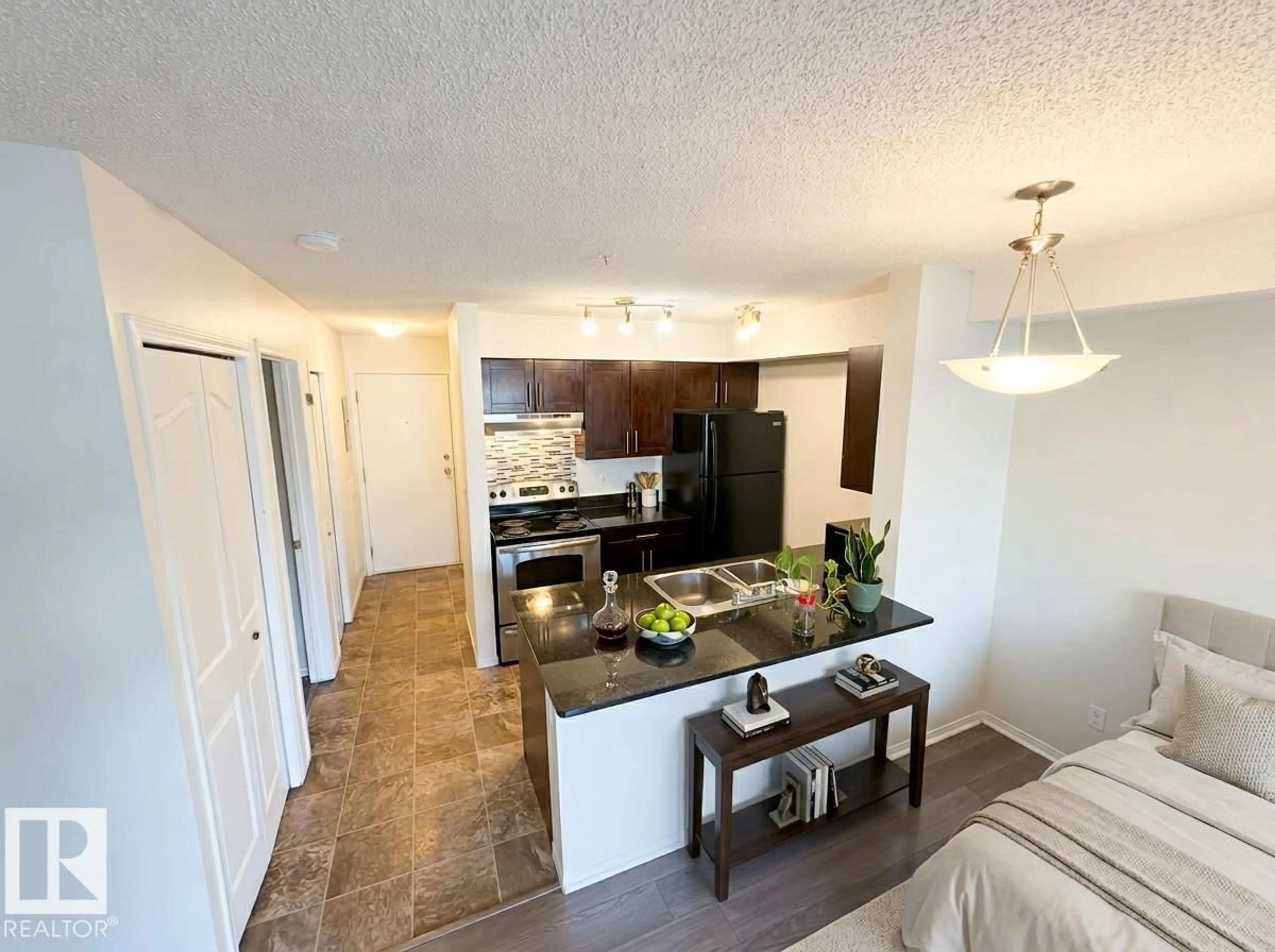 Open concept kitchen, unknown for #107 - 530 WATT BV, Edmonton Alberta T6X1P7