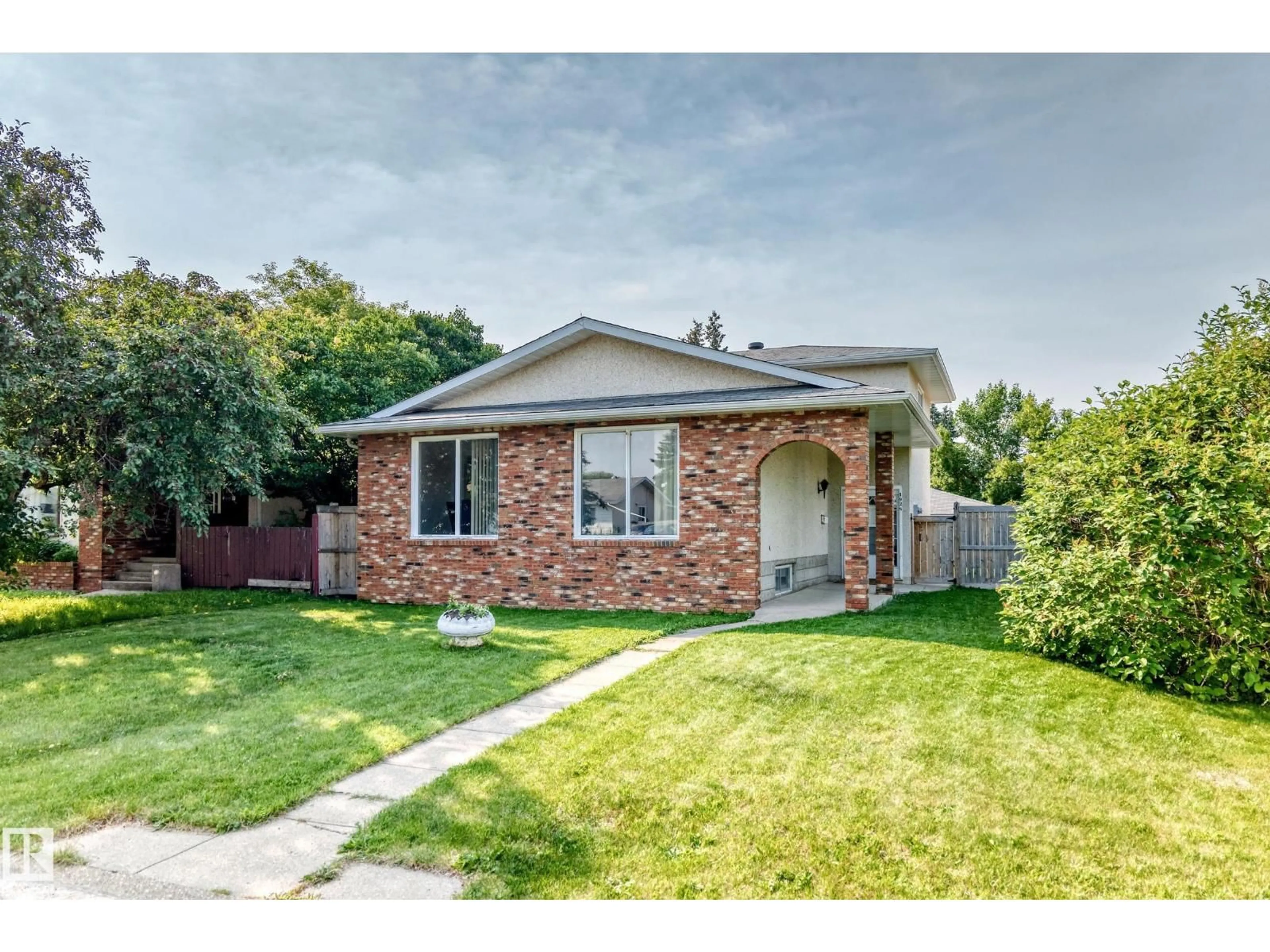 Home with brick exterior material, street for 1928 68 ST, Edmonton Alberta T6K2J4
