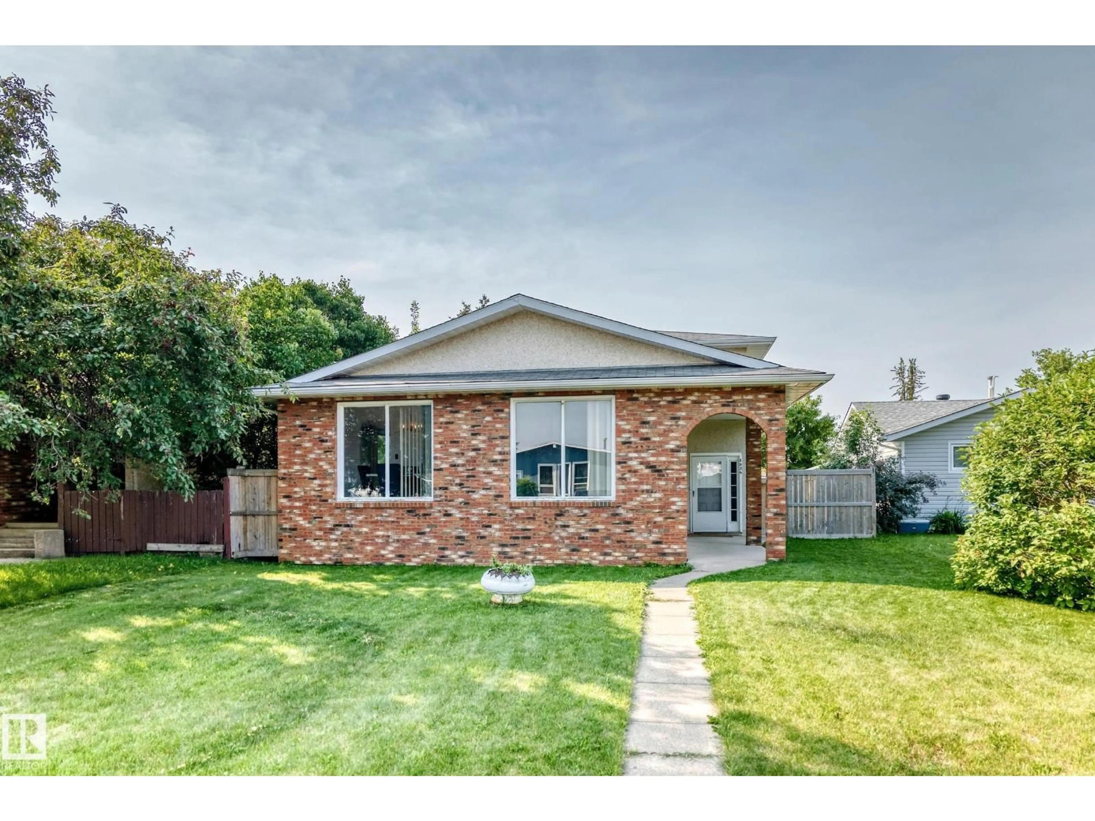 Home with brick exterior material, street for 1928 68 ST, Edmonton Alberta T6K2J4