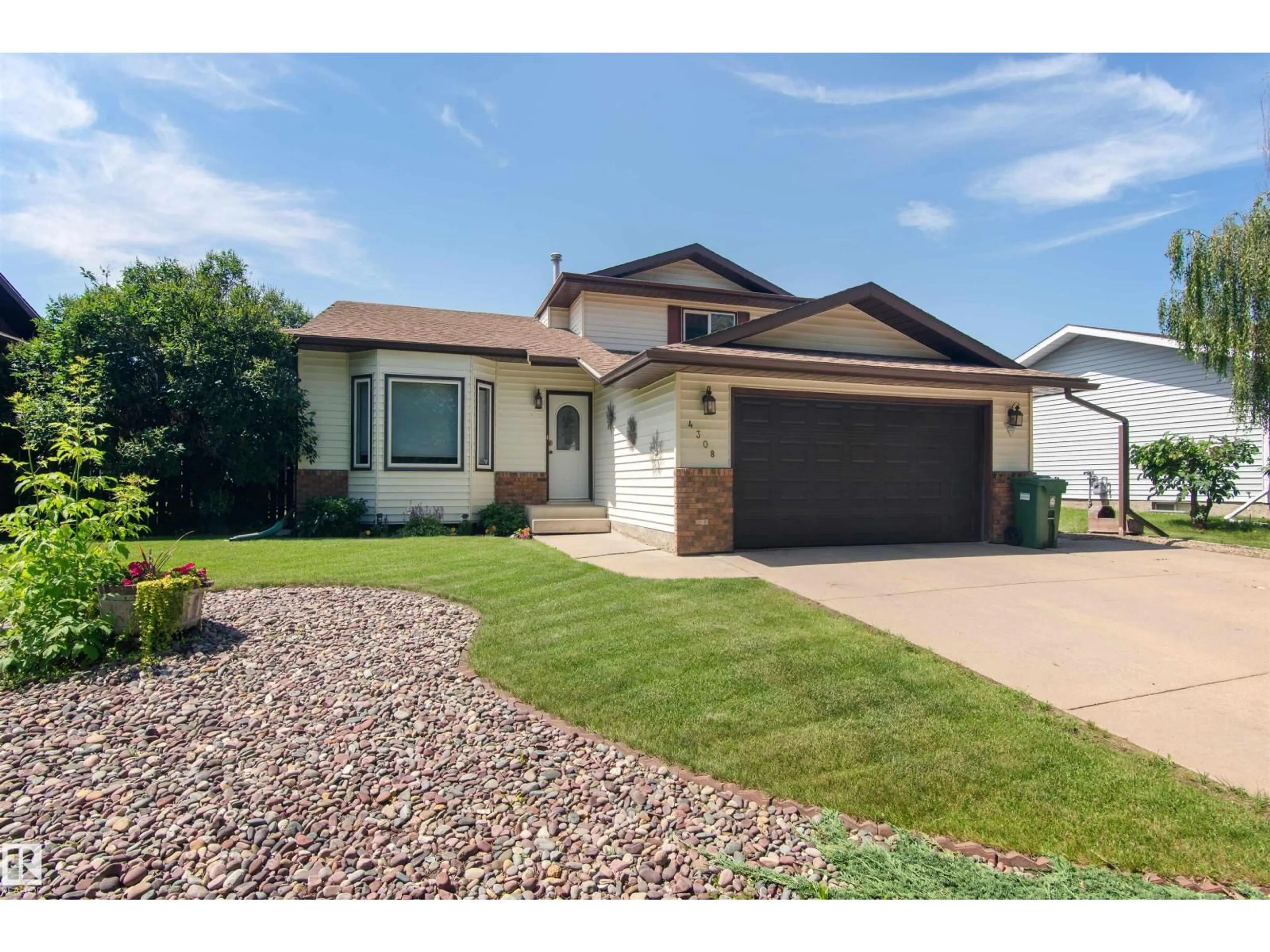Home with vinyl exterior material, street for 4308 41 ST, Bonnyville Town Alberta T9N1V9