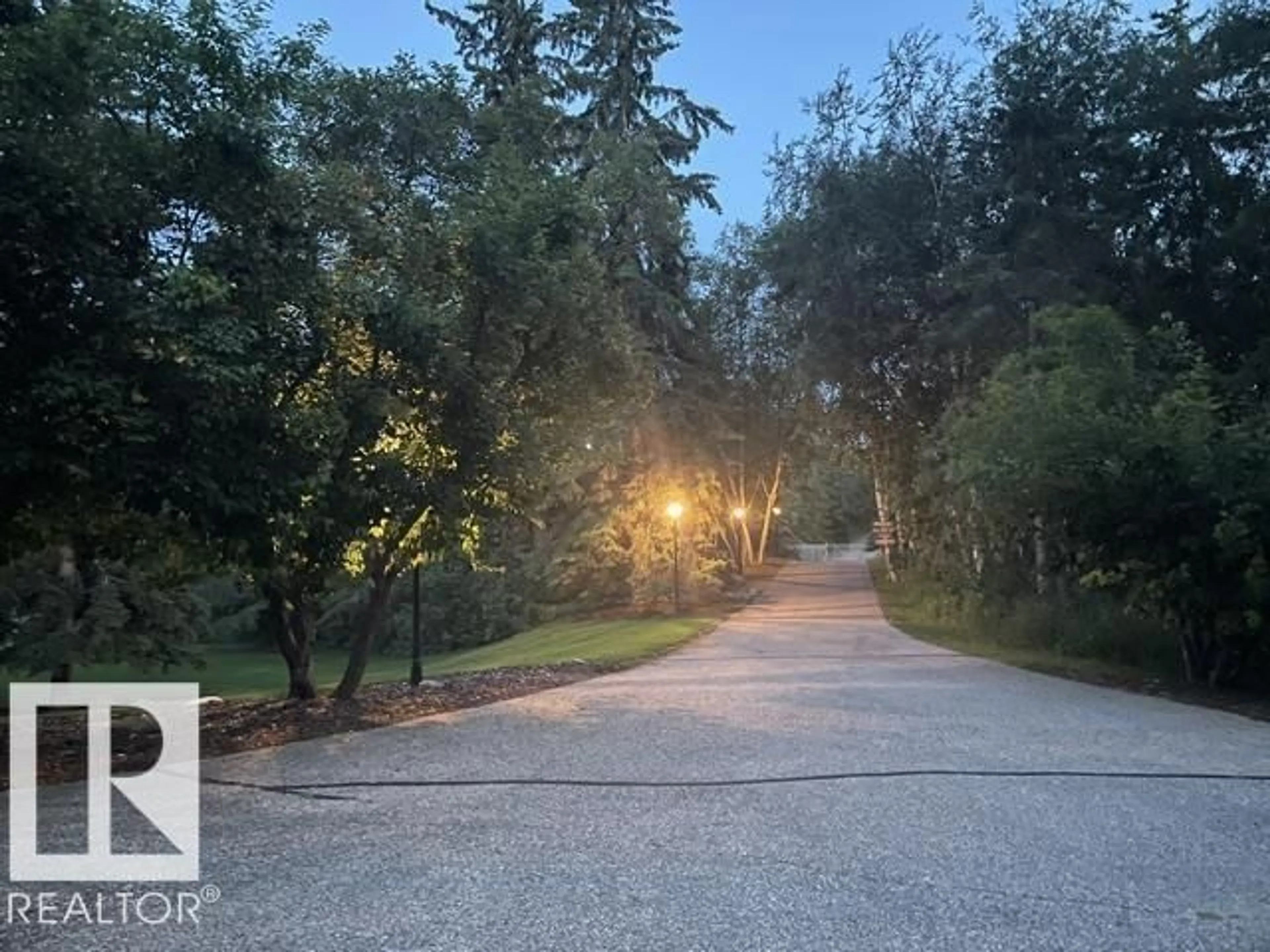 A pic from outside/outdoor area/front of a property/back of a property/a pic from drone, forest/trees view for #2 - 51124 RGE ROAD 264, Rural Parkland County Alberta T7Y1E8