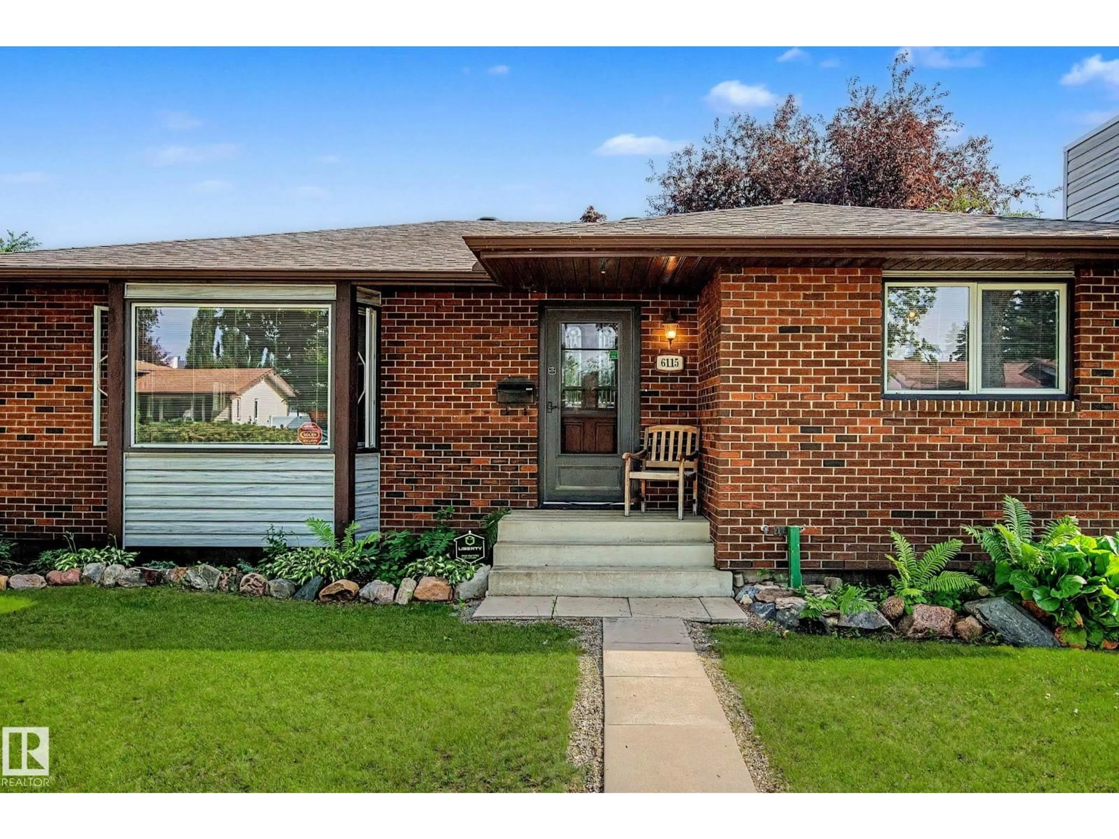 Home with brick exterior material, street for 6115 152A AV, Edmonton Alberta T5A1X9
