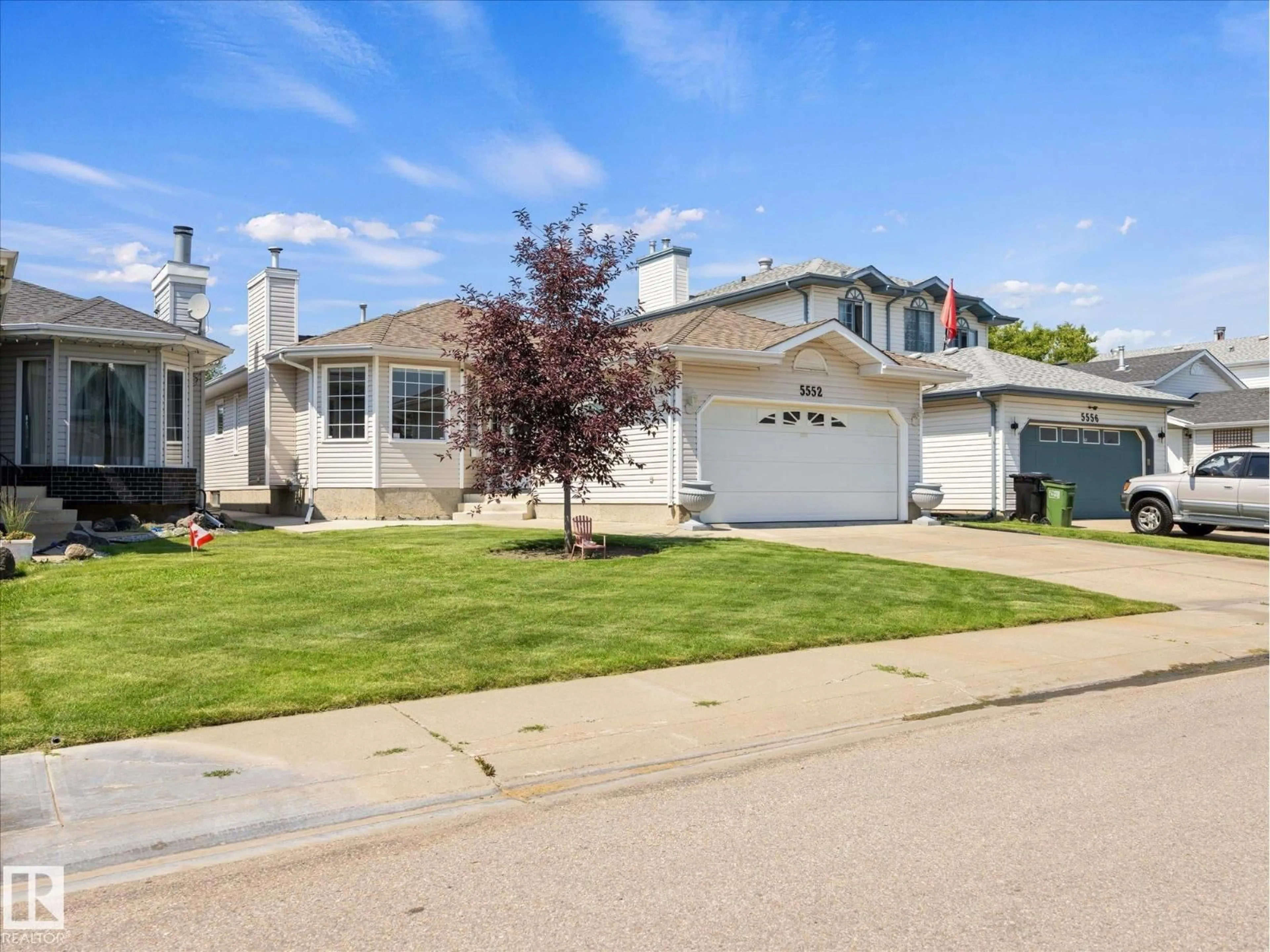 Home with vinyl exterior material, street for NW - 5552 190A ST, Edmonton Alberta T6M2L3