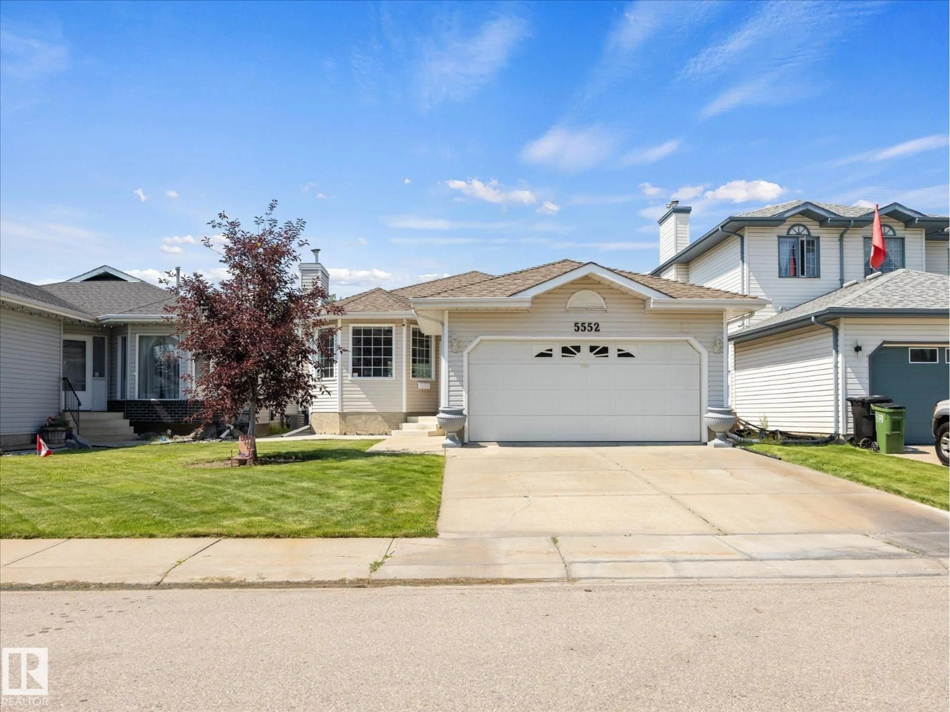 Home with vinyl exterior material, street for NW - 5552 190A ST, Edmonton Alberta T6M2L3
