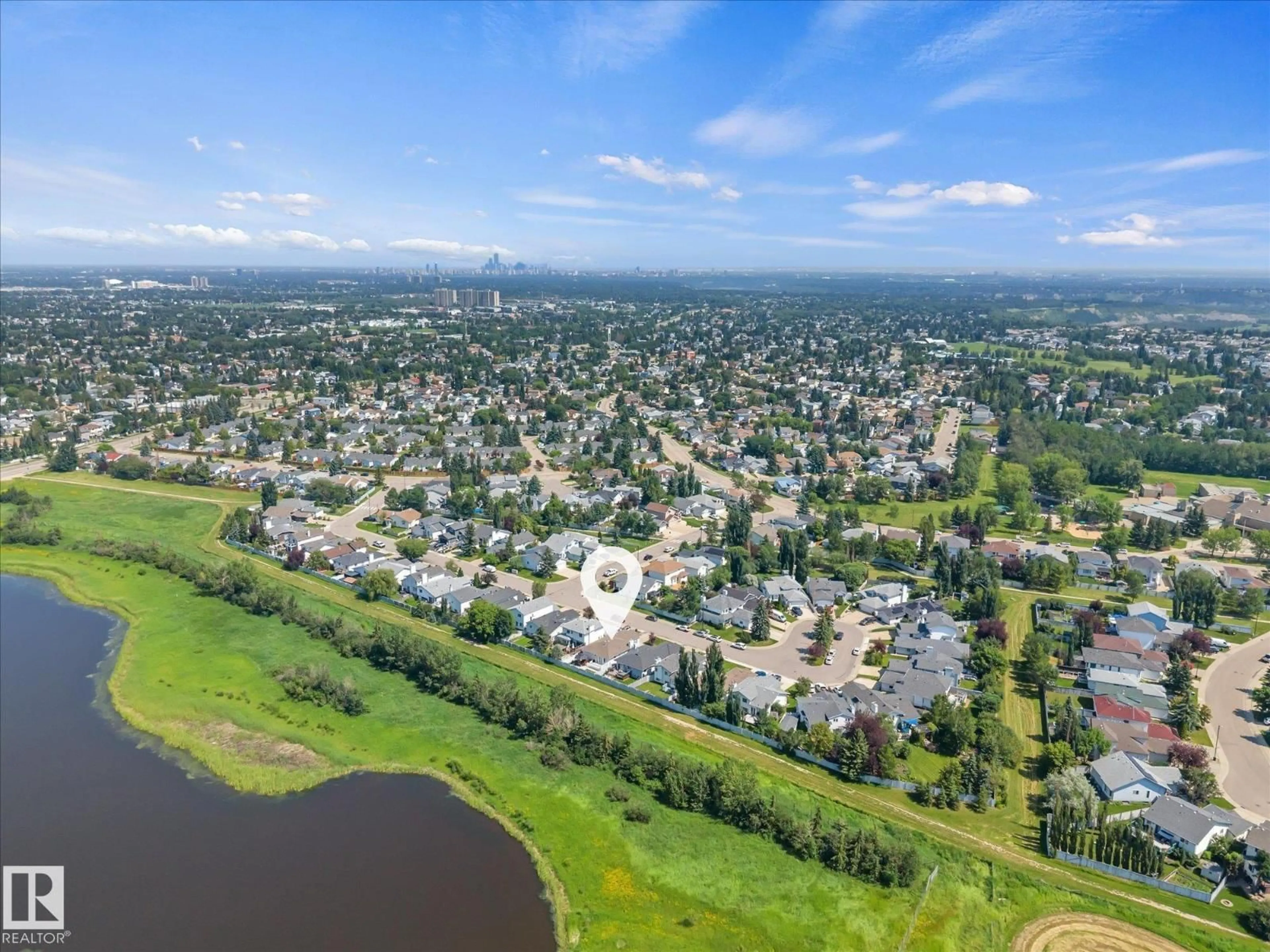A pic from outside/outdoor area/front of a property/back of a property/a pic from drone, water/lake/river/ocean view for NW - 5552 190A ST, Edmonton Alberta T6M2L3