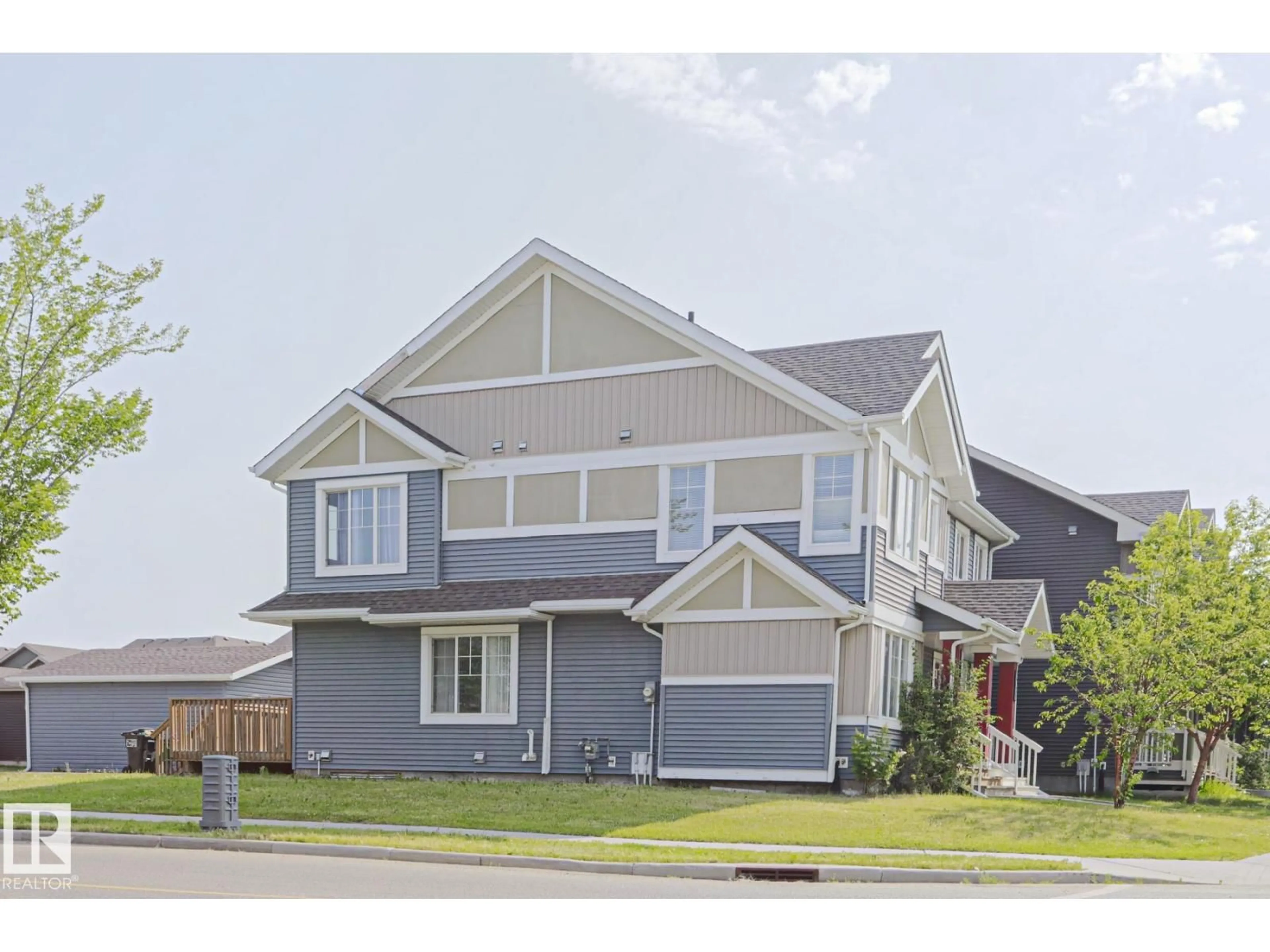 Home with vinyl exterior material, street for 489 ORCHARDS BV, Edmonton Alberta T6X2B7