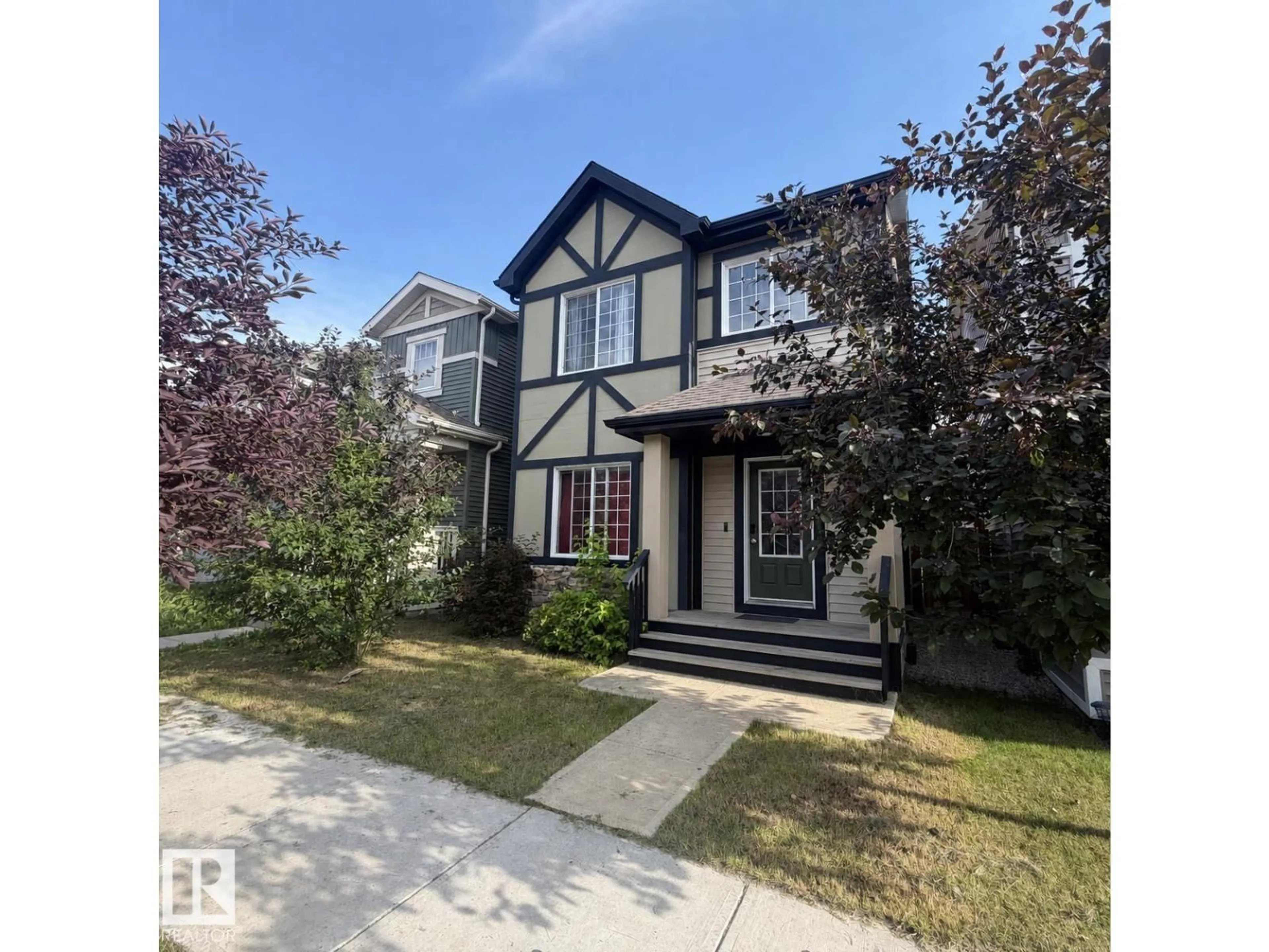 Home with vinyl exterior material, street for 2572 COUGHLAN RD, Edmonton Alberta T6W2Z6