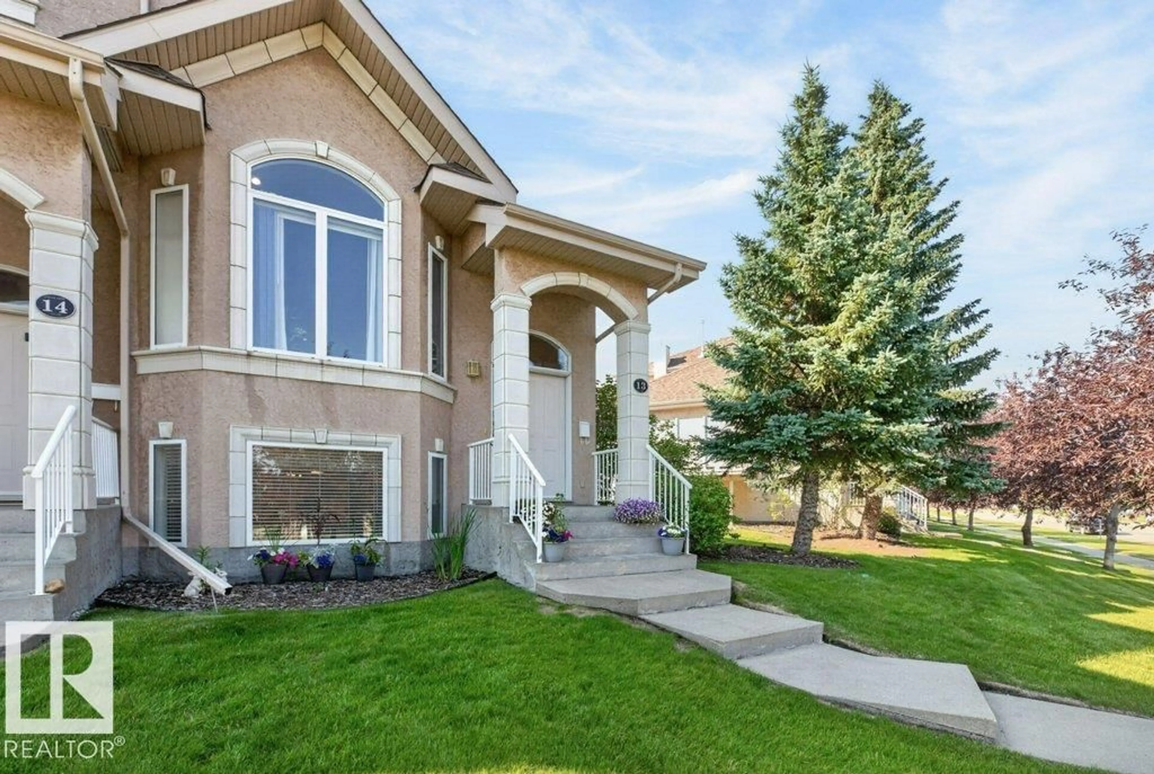 Home with vinyl exterior material, street for 13 101 JIM COMMON DR, Sherwood Park Alberta T8H2M1