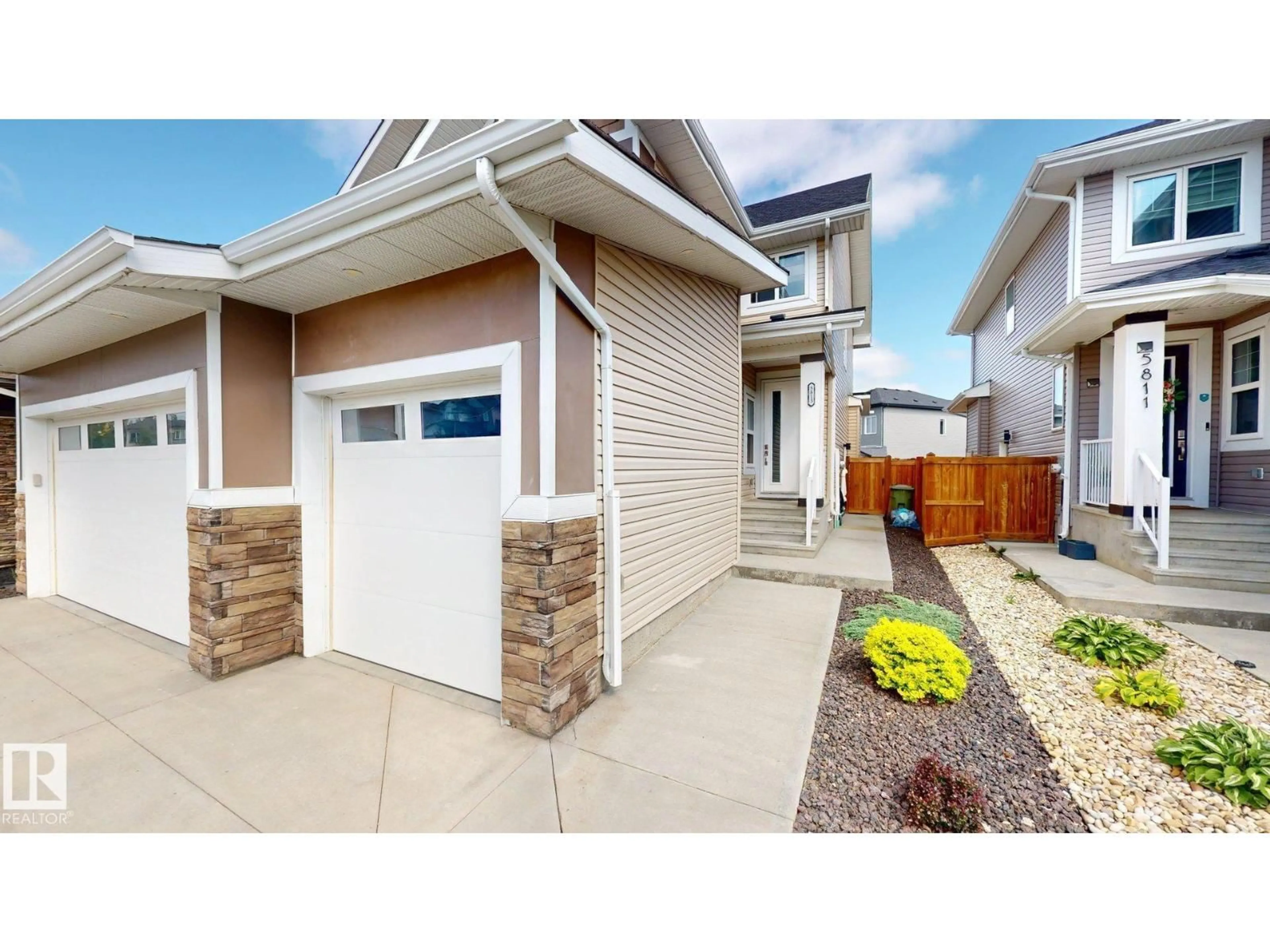 Home with vinyl exterior material, street for 5813 PELERIN CR, Beaumont Alberta T4X2X8