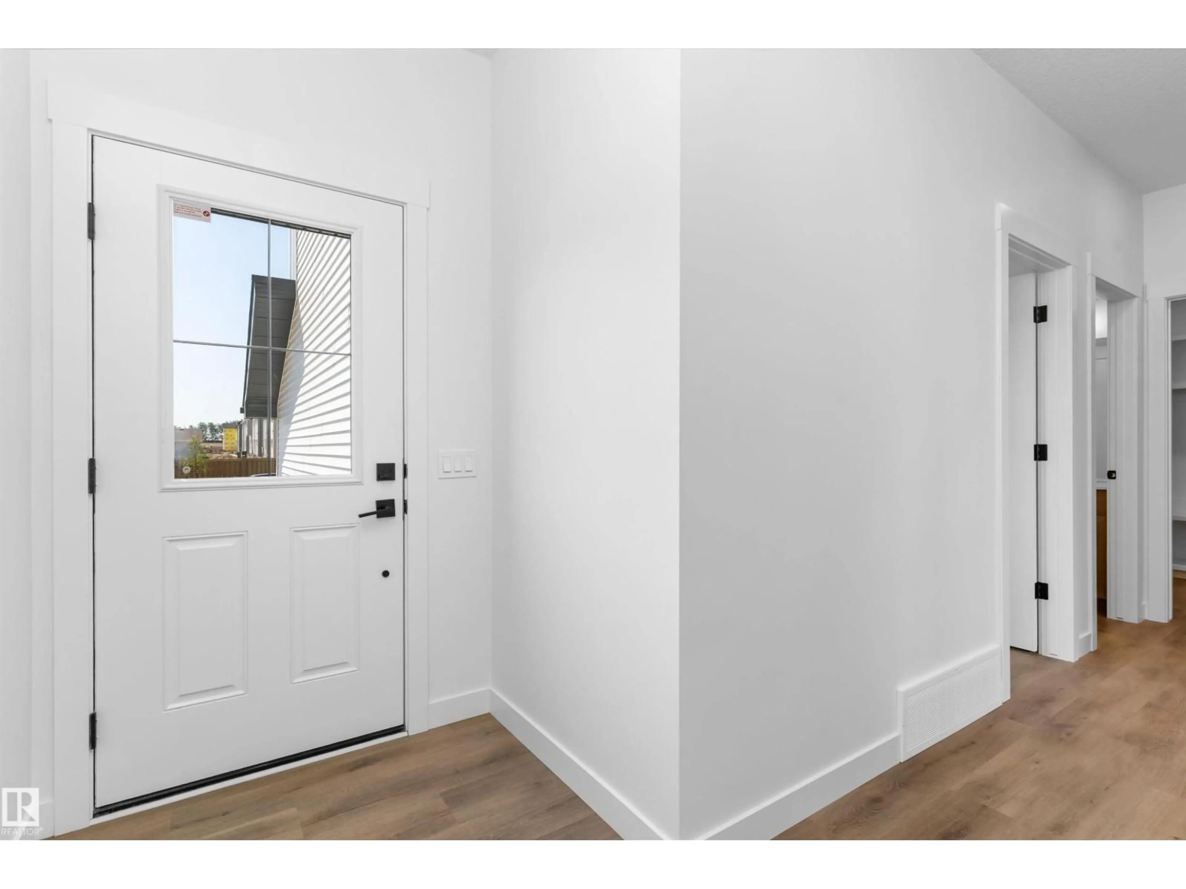 Indoor entryway for 2224 5 AV, Edmonton Alberta T6X3L8
