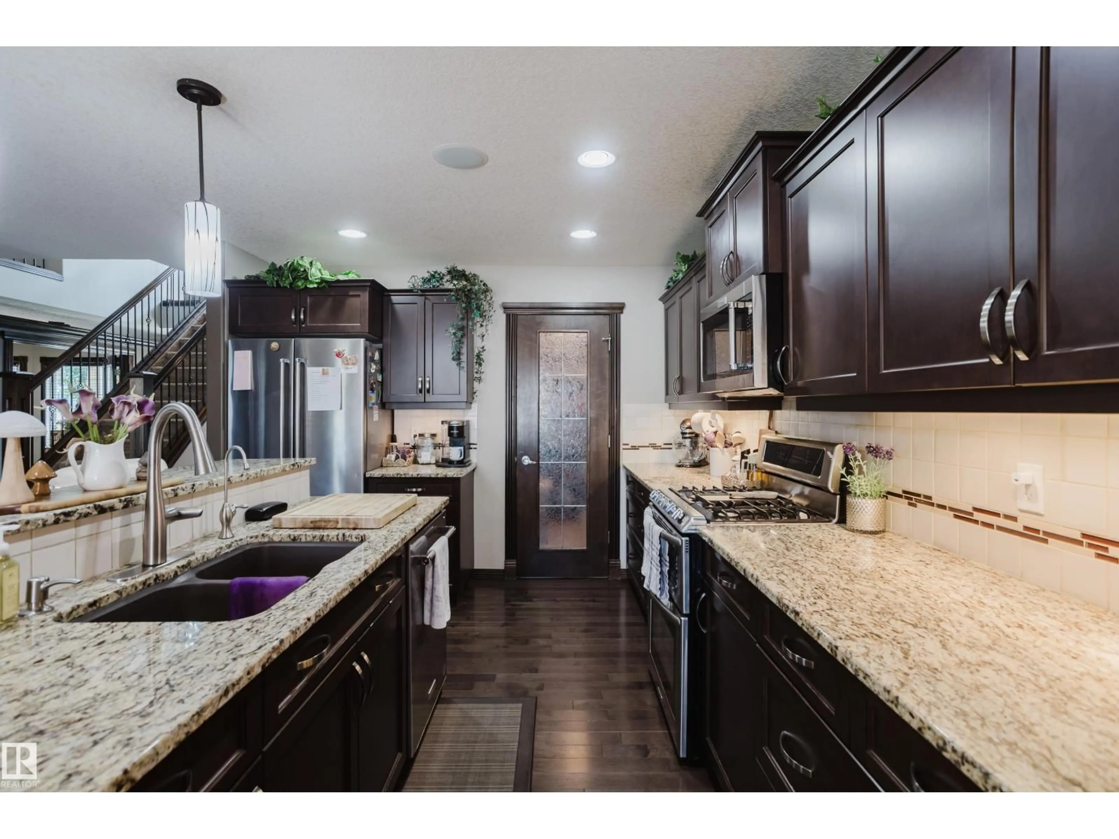 Open concept kitchen, ceramic/tile floor for 9729 159 ST, Edmonton Alberta T5P2Z4