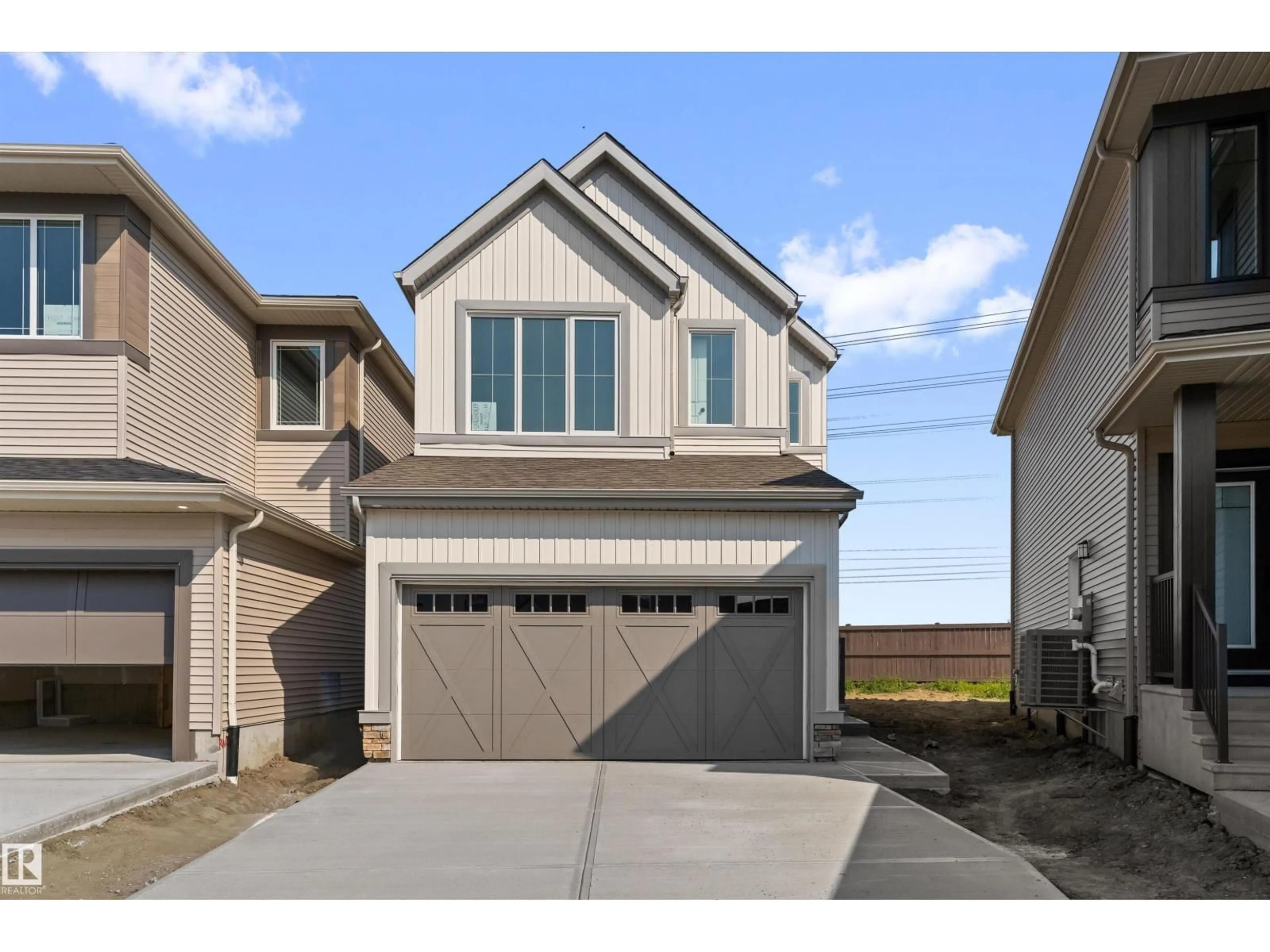 Home with vinyl exterior material, street for 19356 29 AV, Edmonton Alberta T6M3B1