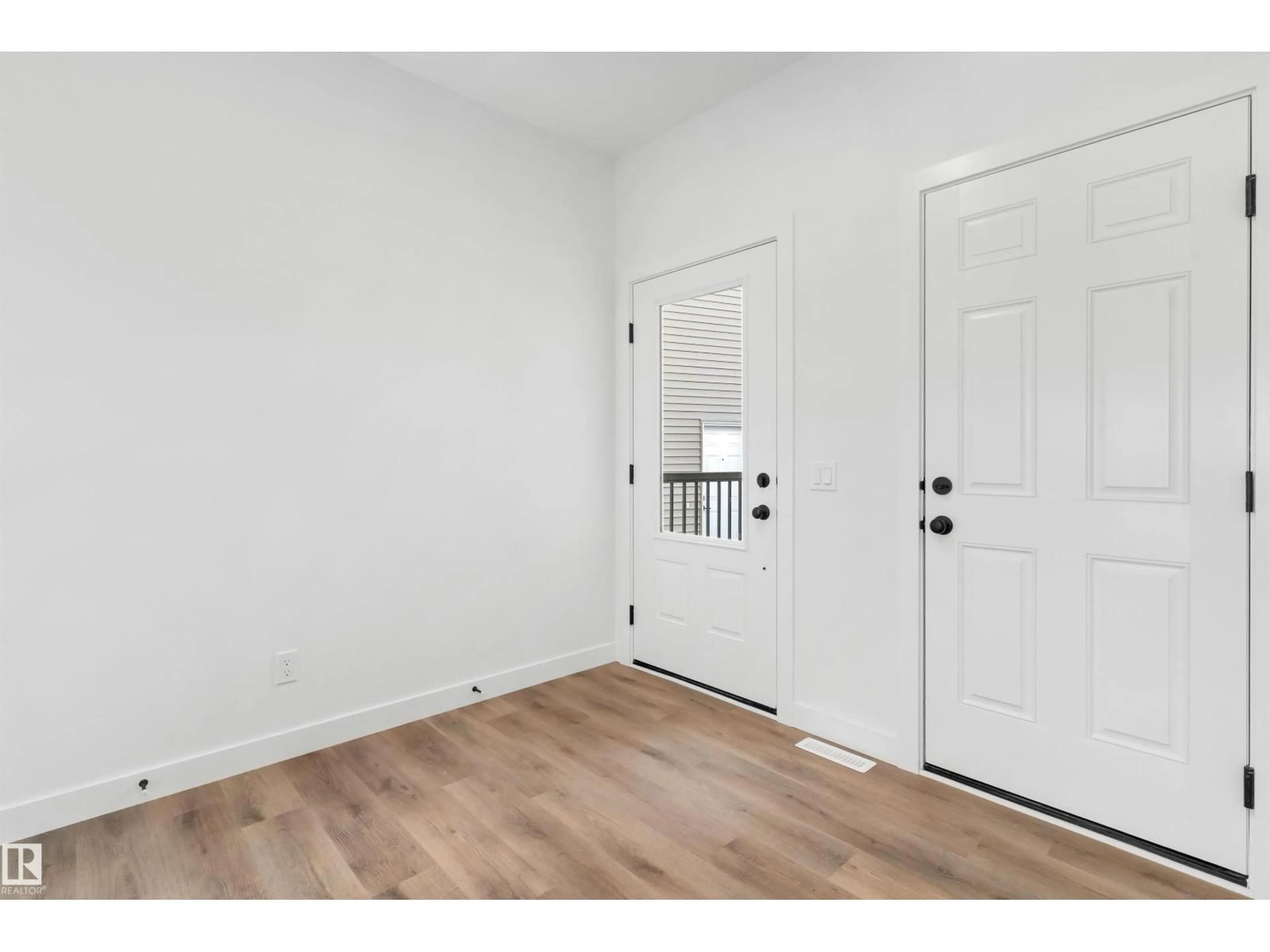 Indoor entryway for 19356 29 AV, Edmonton Alberta T6M3B1