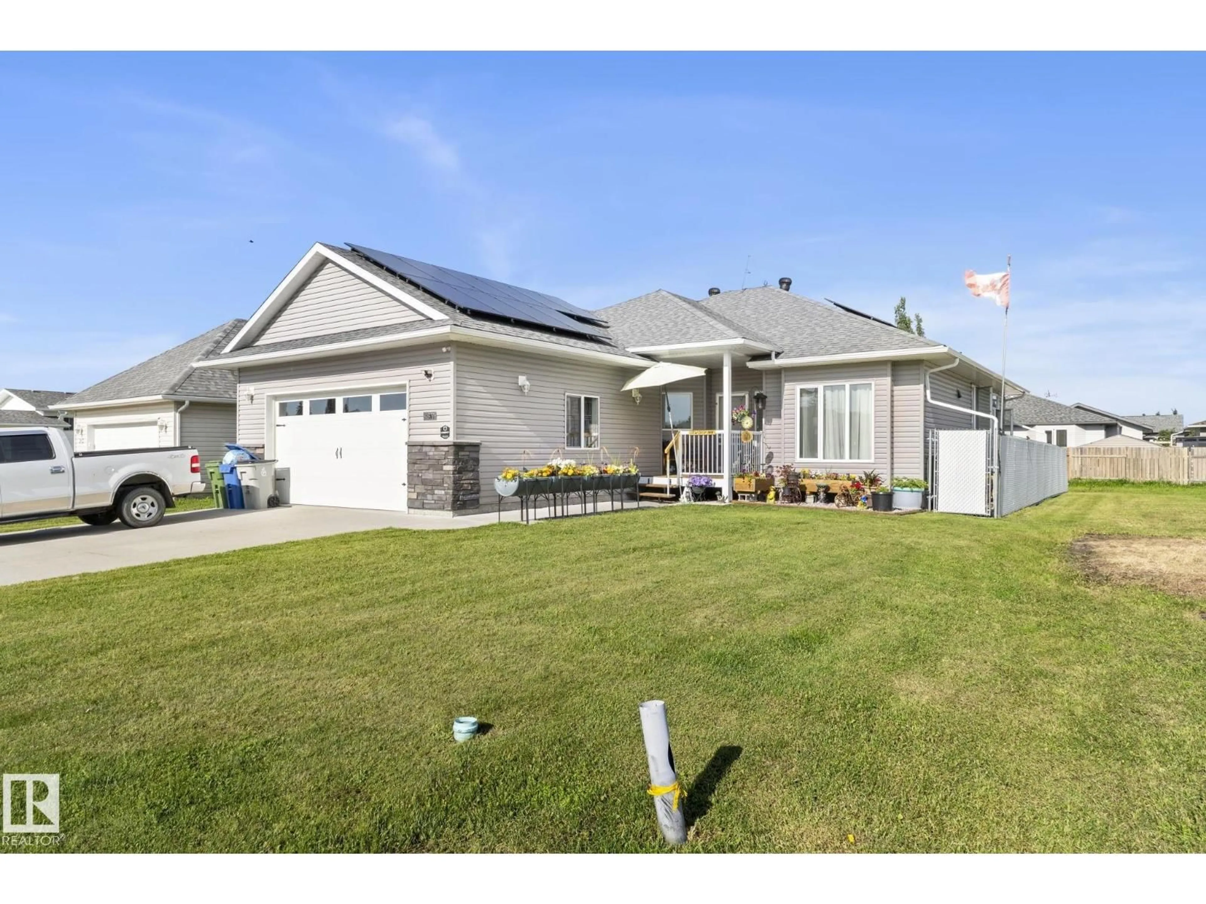 Home with vinyl exterior material, street for 4809 55 ST, Bruderheim Alberta T0B0S0