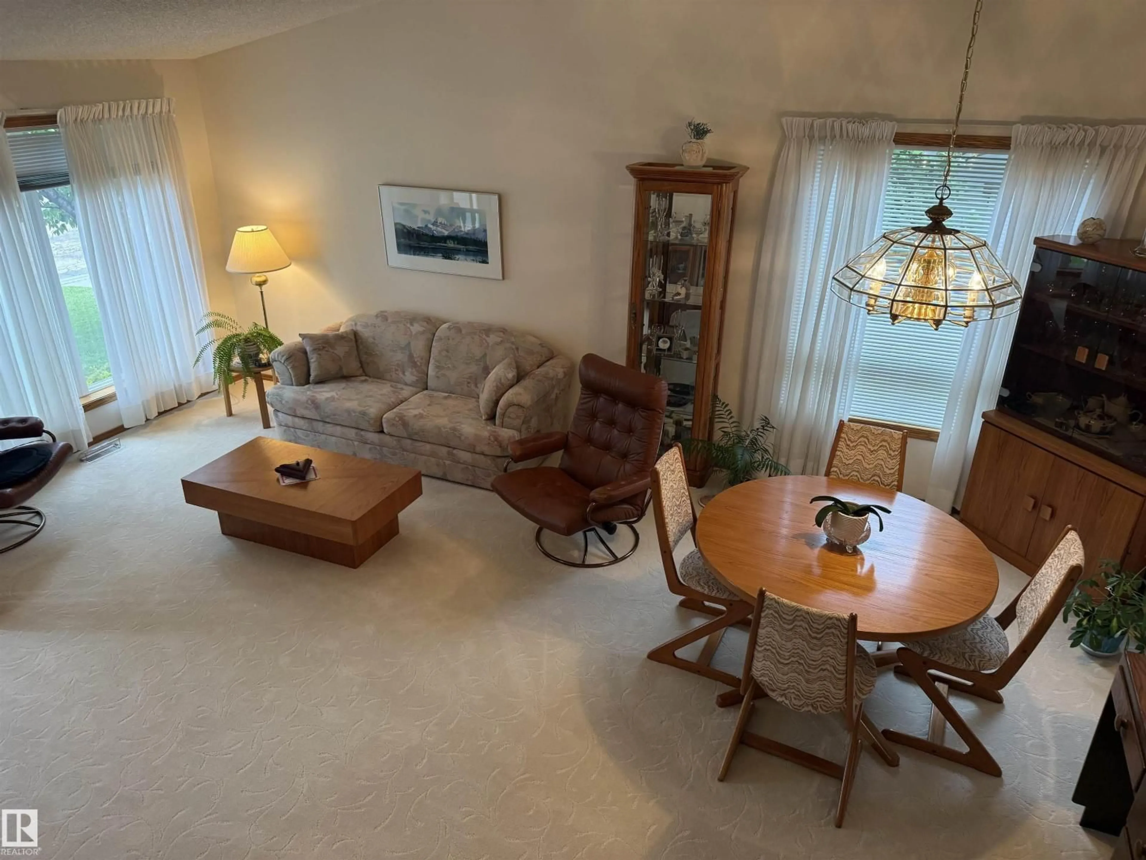 Living room with furniture, unknown for 1147 POTTER GREENS DR, Edmonton Alberta T5T5Y4