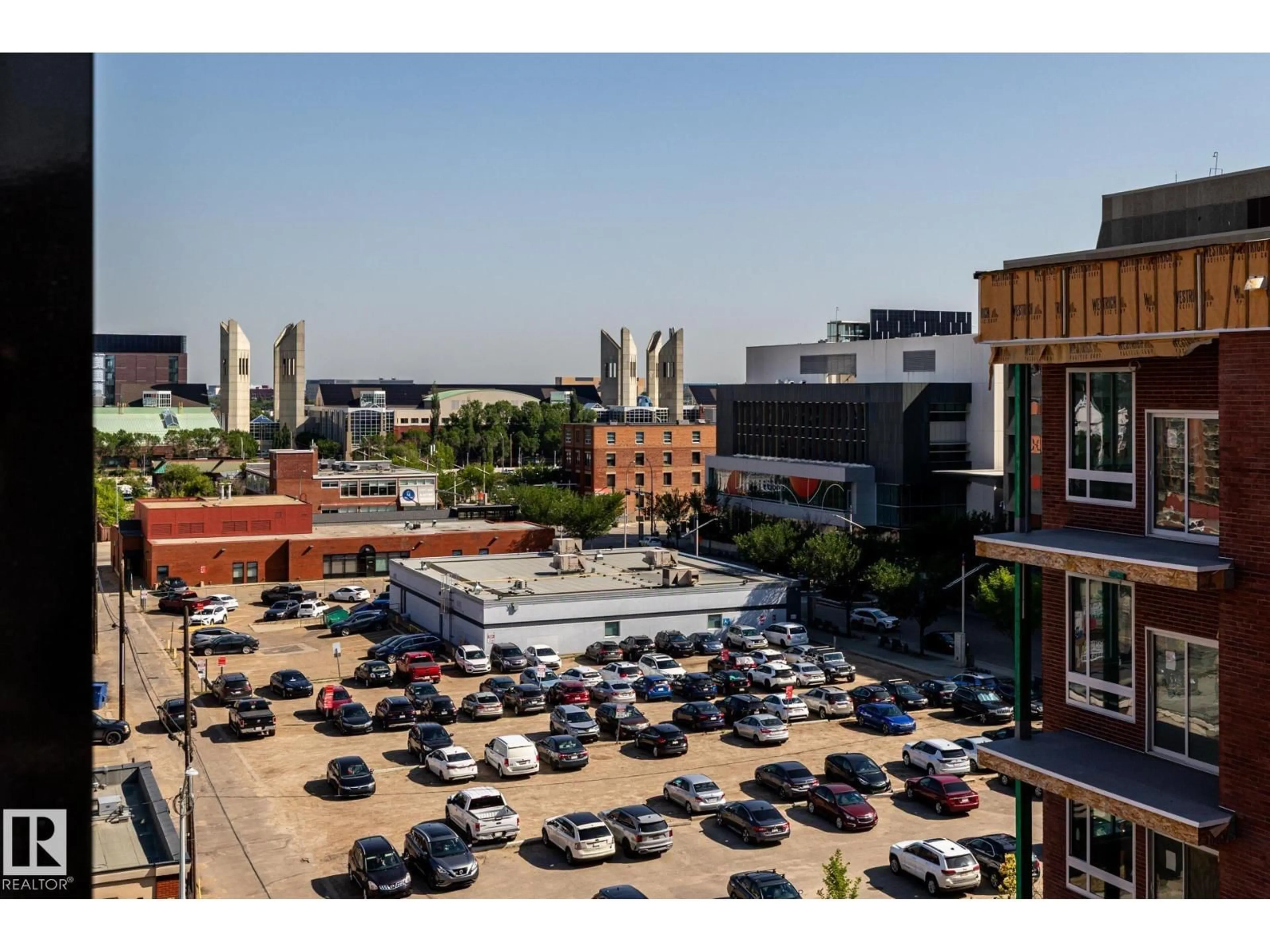 A pic from outside/outdoor area/front of a property/back of a property/a pic from drone, unknown for 703 - 10175 109 ST NW, Edmonton Alberta T5J3P2