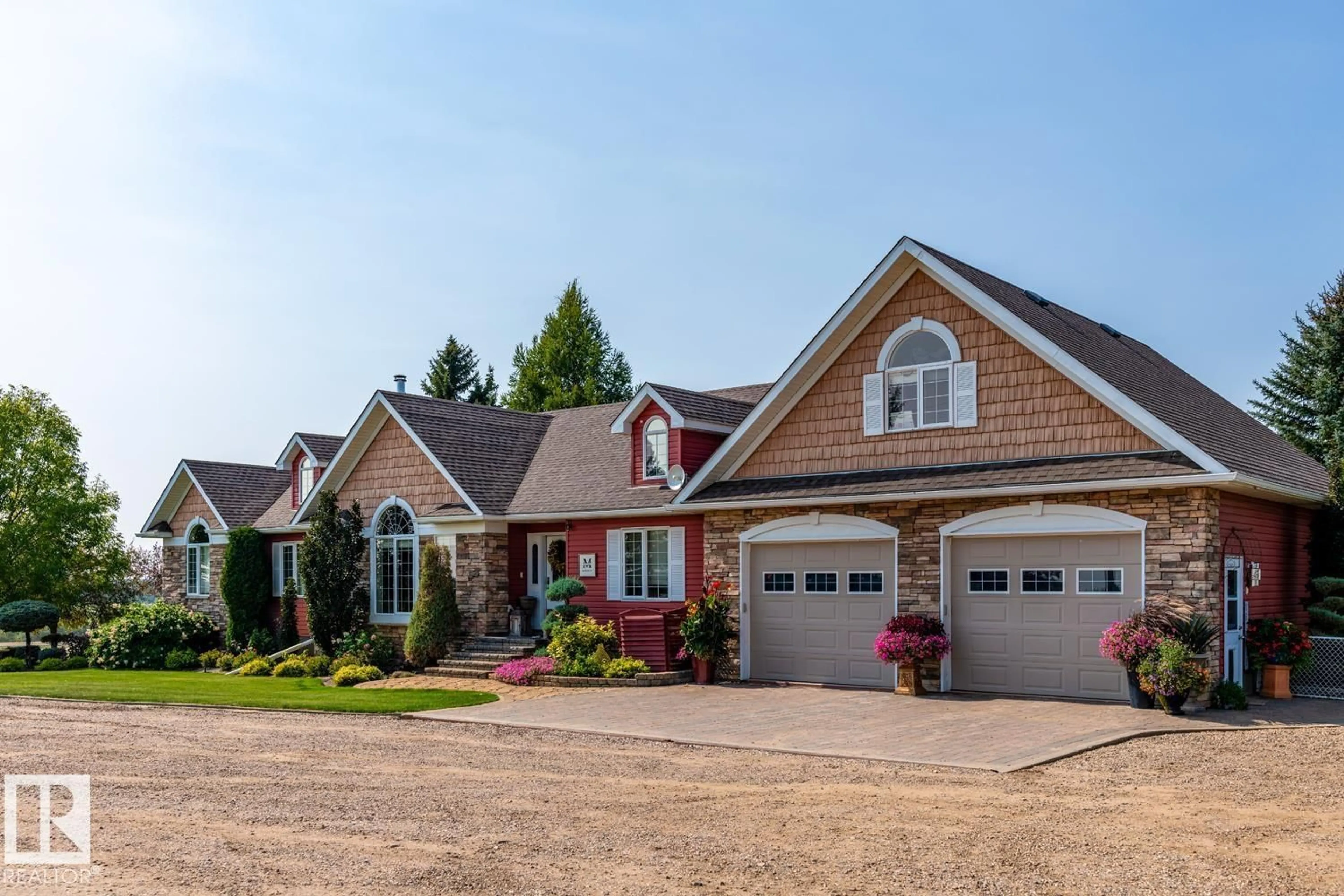 Home with brick exterior material, street for 451066 RANGE ROAD 73, Rural Wainwright M.D. Alberta T9W1T4