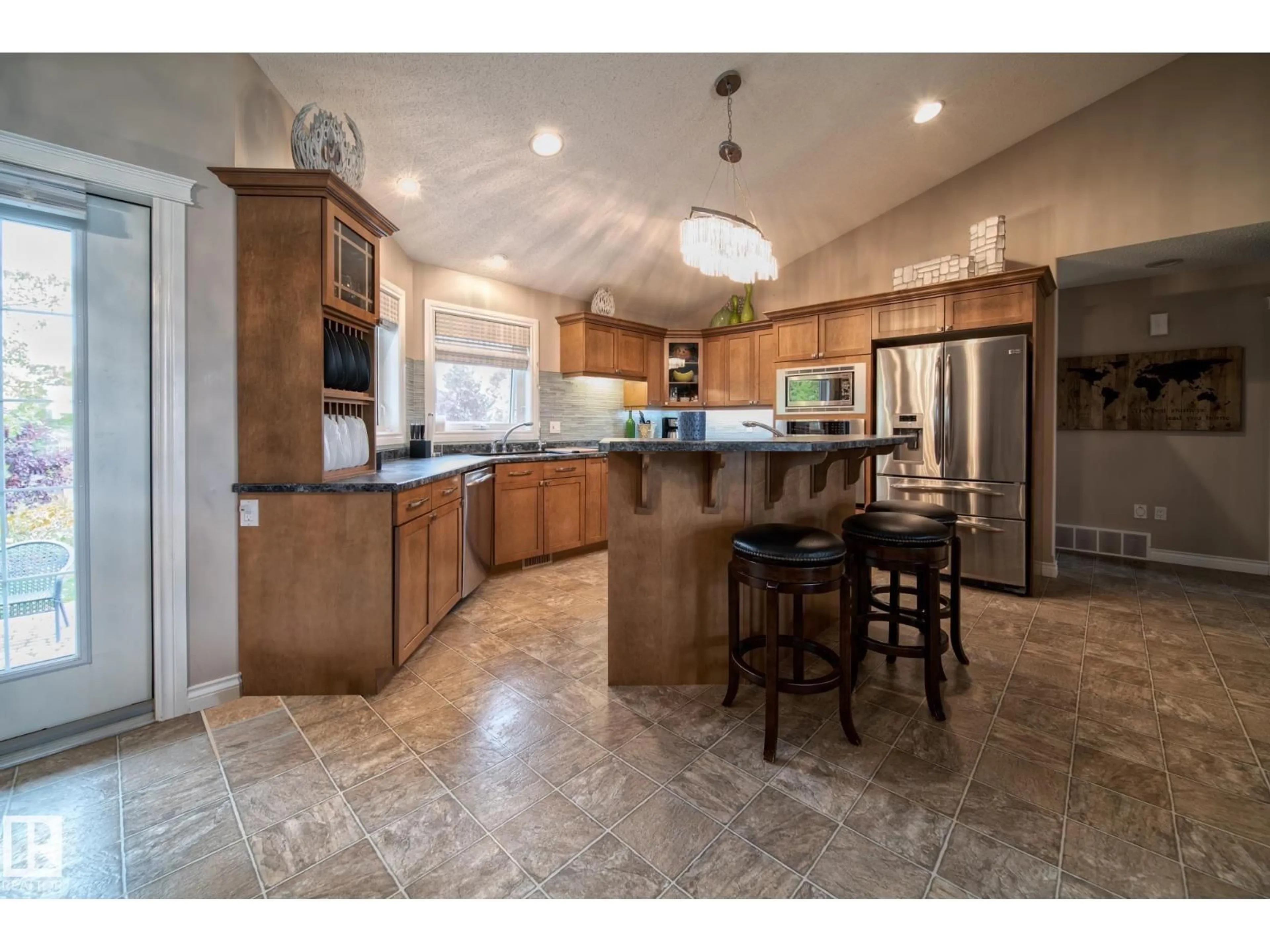 Open concept kitchen, ceramic/tile floor for 451066 RANGE ROAD 73, Rural Wainwright M.D. Alberta T9W1T4