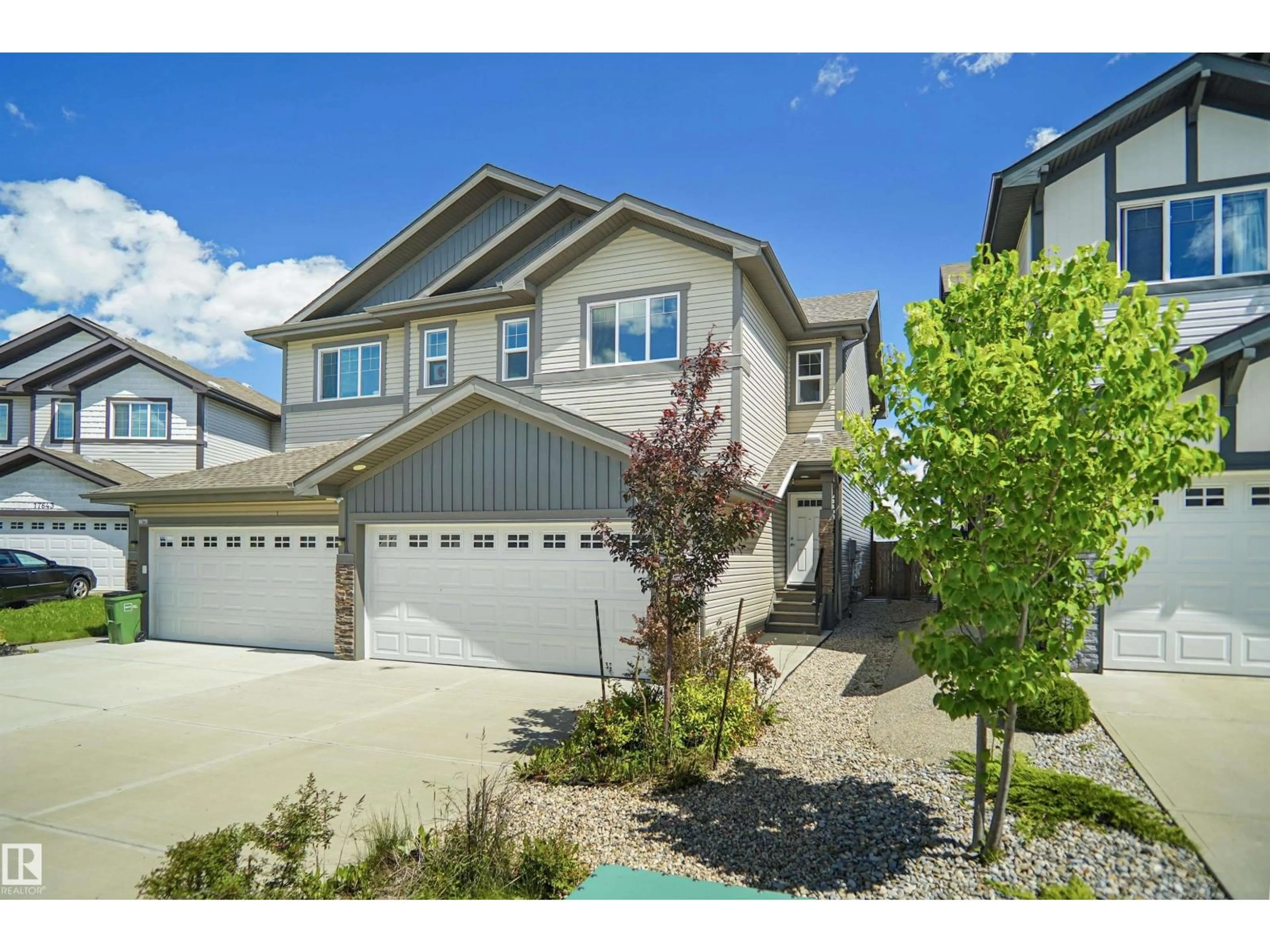 Home with vinyl exterior material, street for 17639 120 ST, Edmonton Alberta T5X0K8