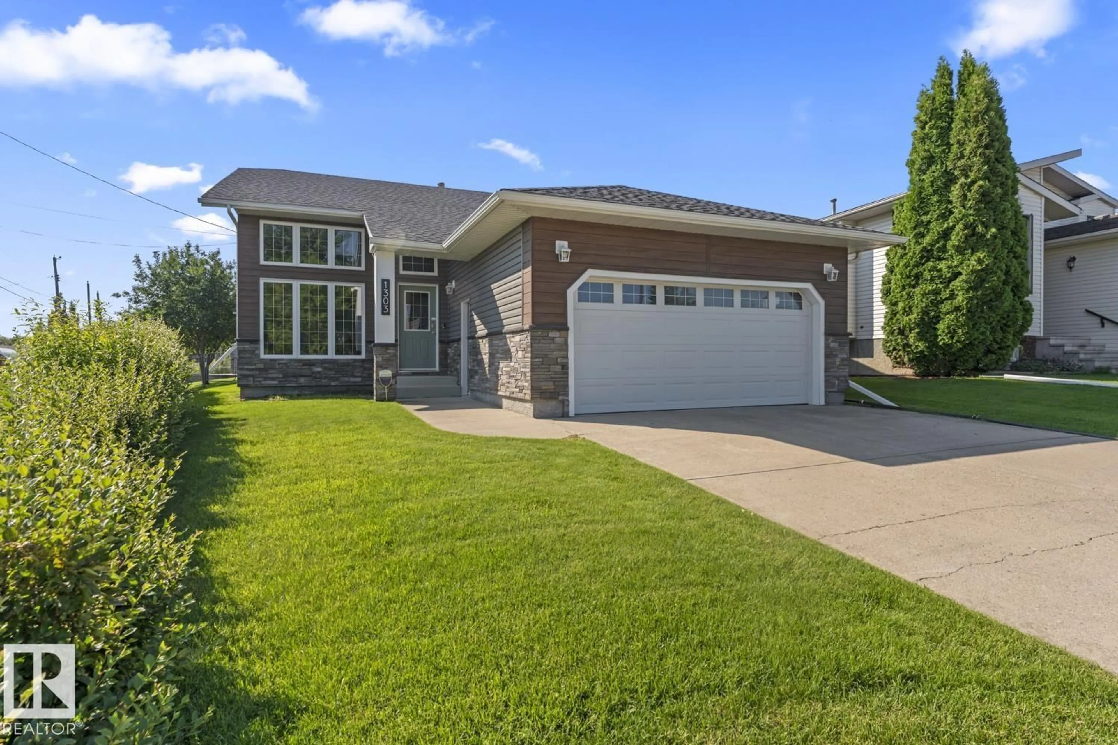 Home with brick exterior material, street for 1303 5 AV, Cold Lake Alberta T9M1C1