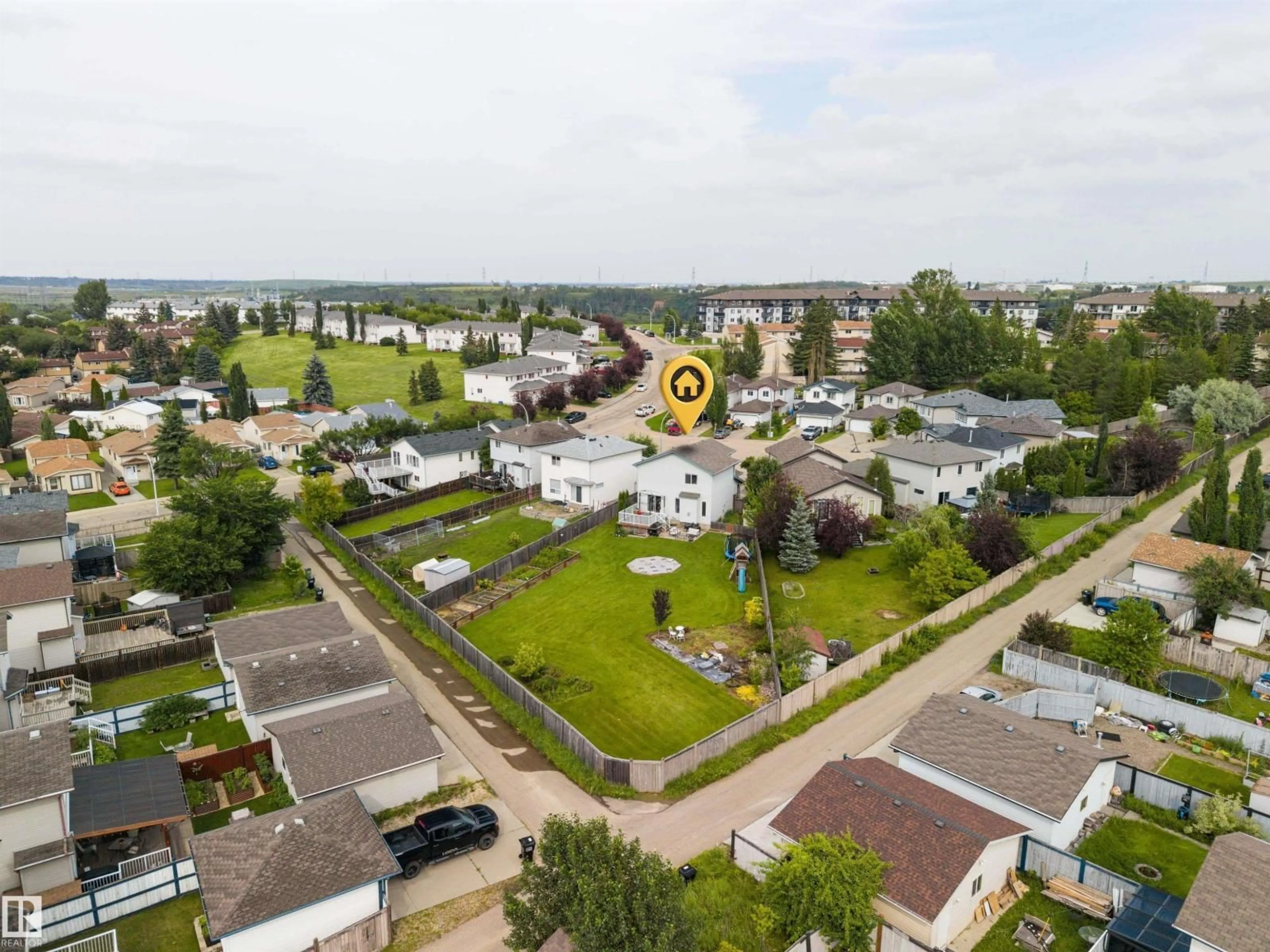 A pic from outside/outdoor area/front of a property/back of a property/a pic from drone, city buildings view from balcony for 214 HYNDMAN CR, Edmonton Alberta T5A5H9