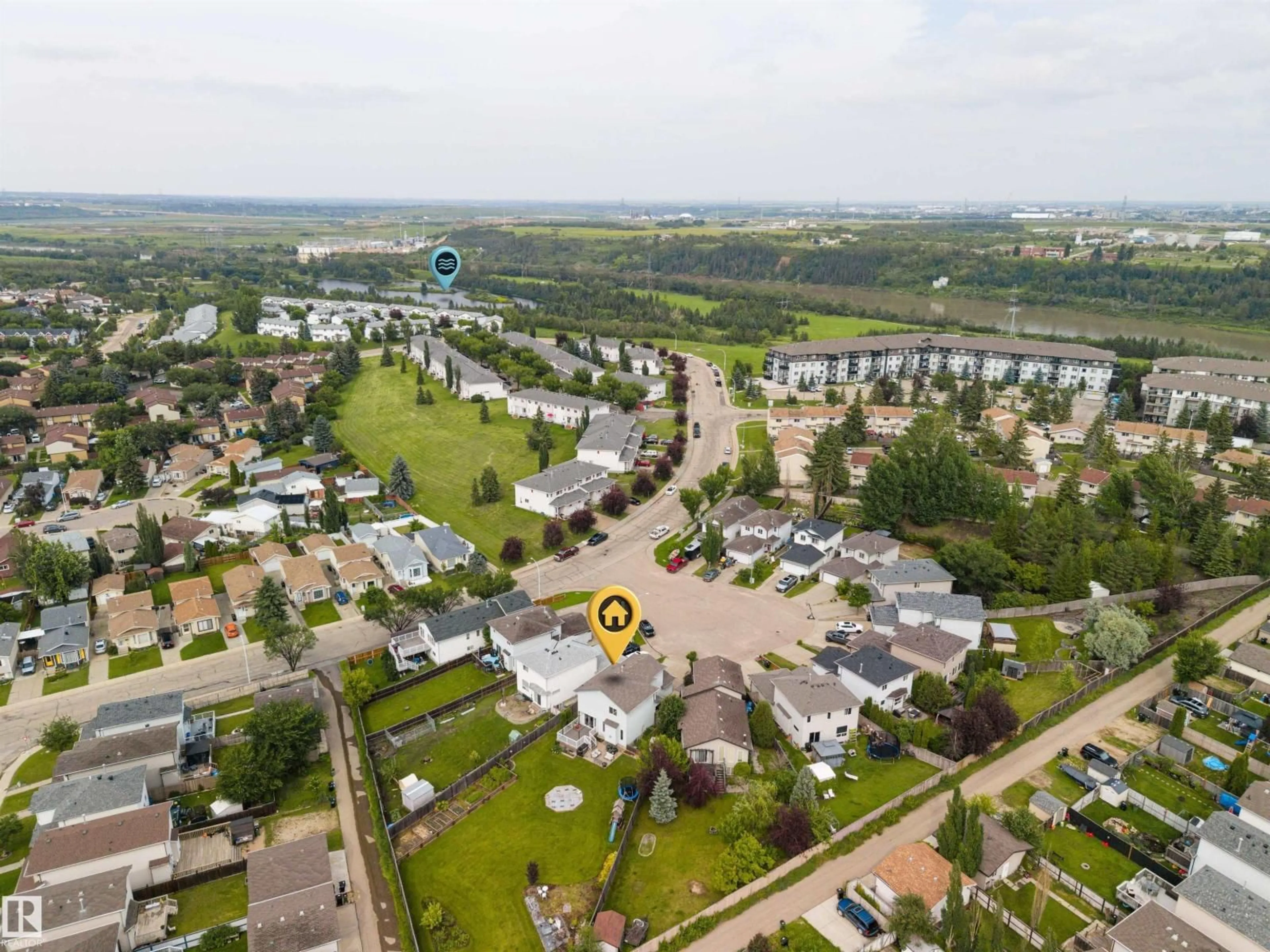 A pic from outside/outdoor area/front of a property/back of a property/a pic from drone, water/lake/river/ocean view for 214 HYNDMAN CR, Edmonton Alberta T5A5H9