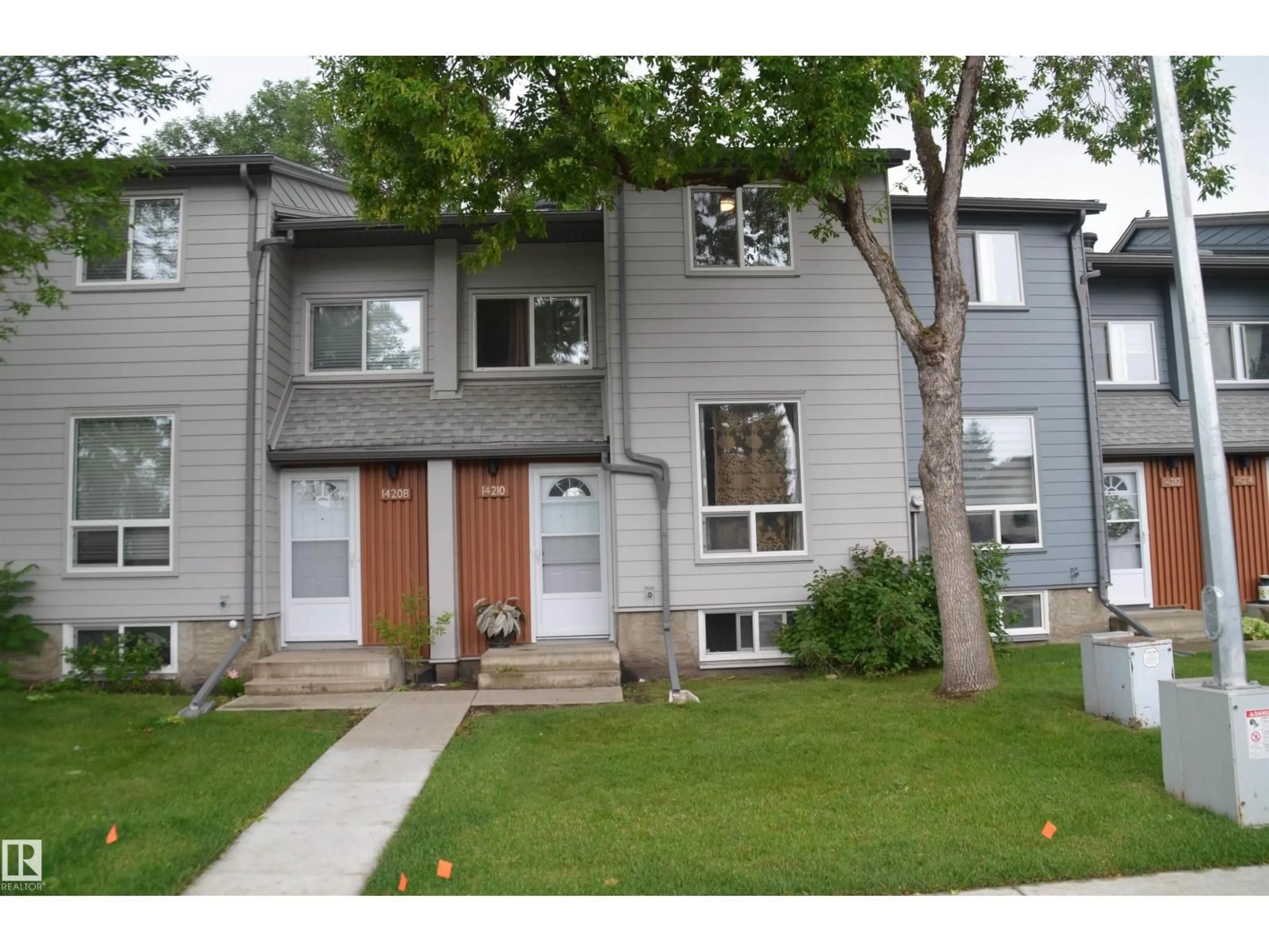 Home with vinyl exterior material, street for 14210 31 ST, Edmonton Alberta T5Y1H1