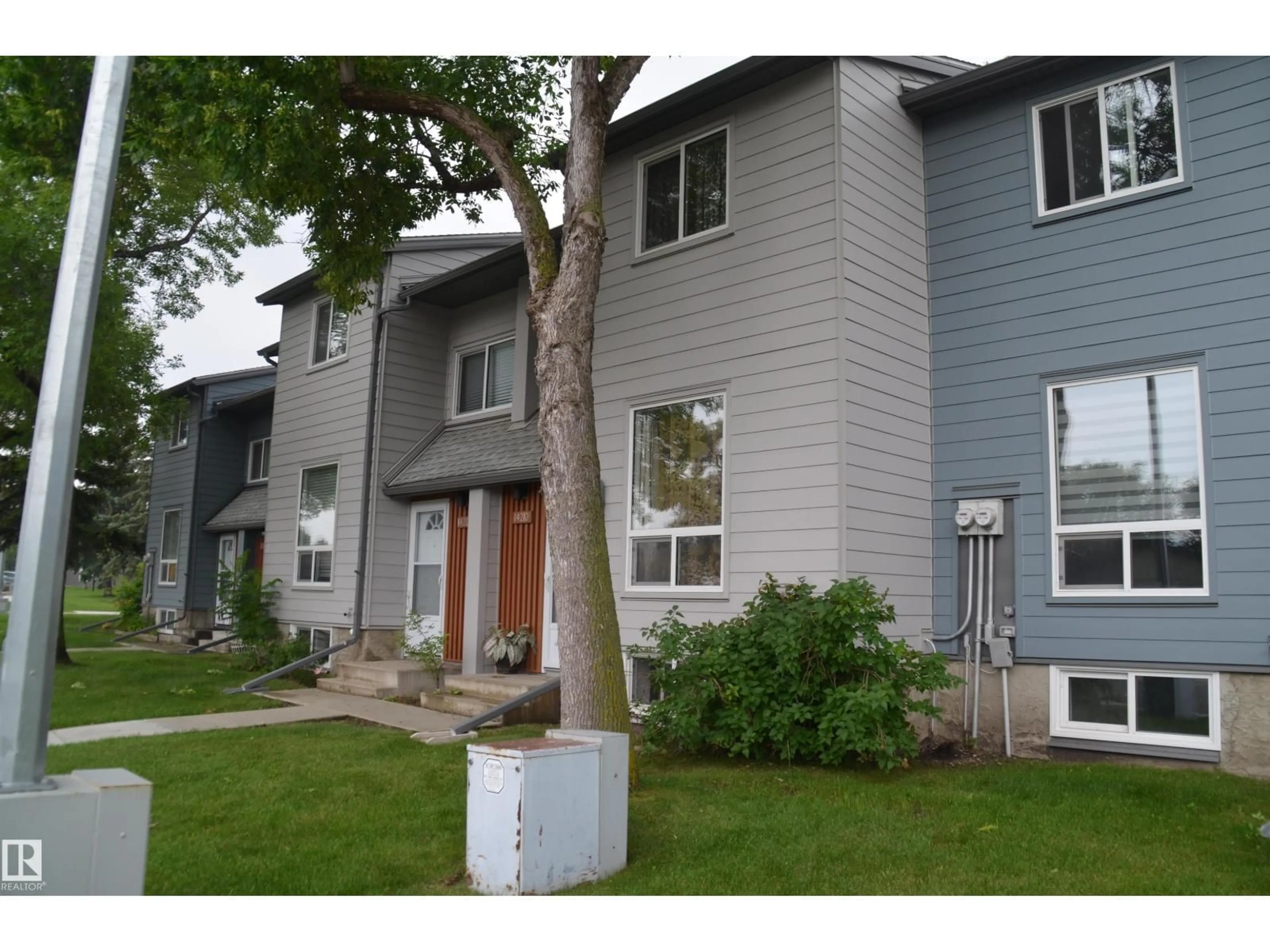 Home with vinyl exterior material, street for 14210 31 ST, Edmonton Alberta T5Y1H1
