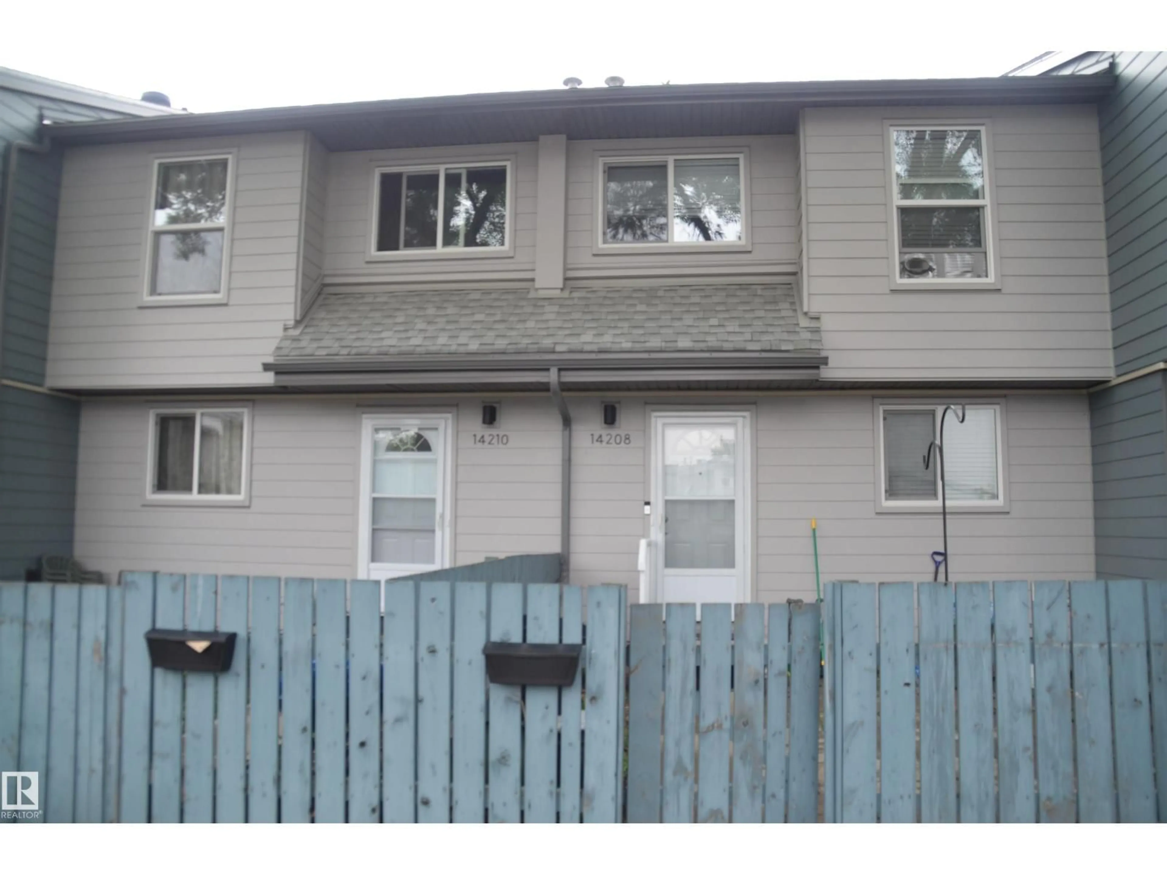 Home with vinyl exterior material, street for 14210 31 ST, Edmonton Alberta T5Y1H1