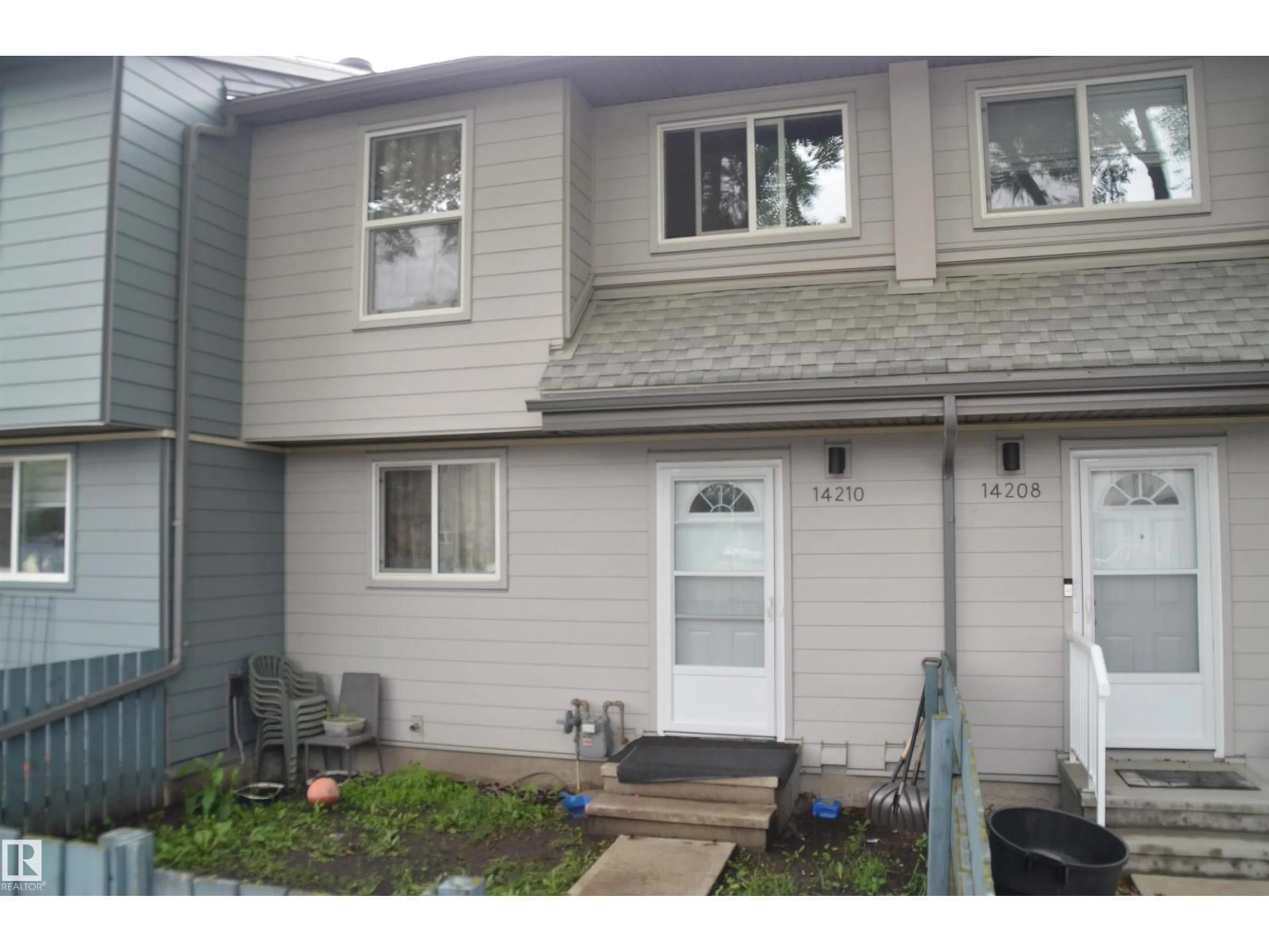 Home with vinyl exterior material, street for 14210 31 ST, Edmonton Alberta T5Y1H1