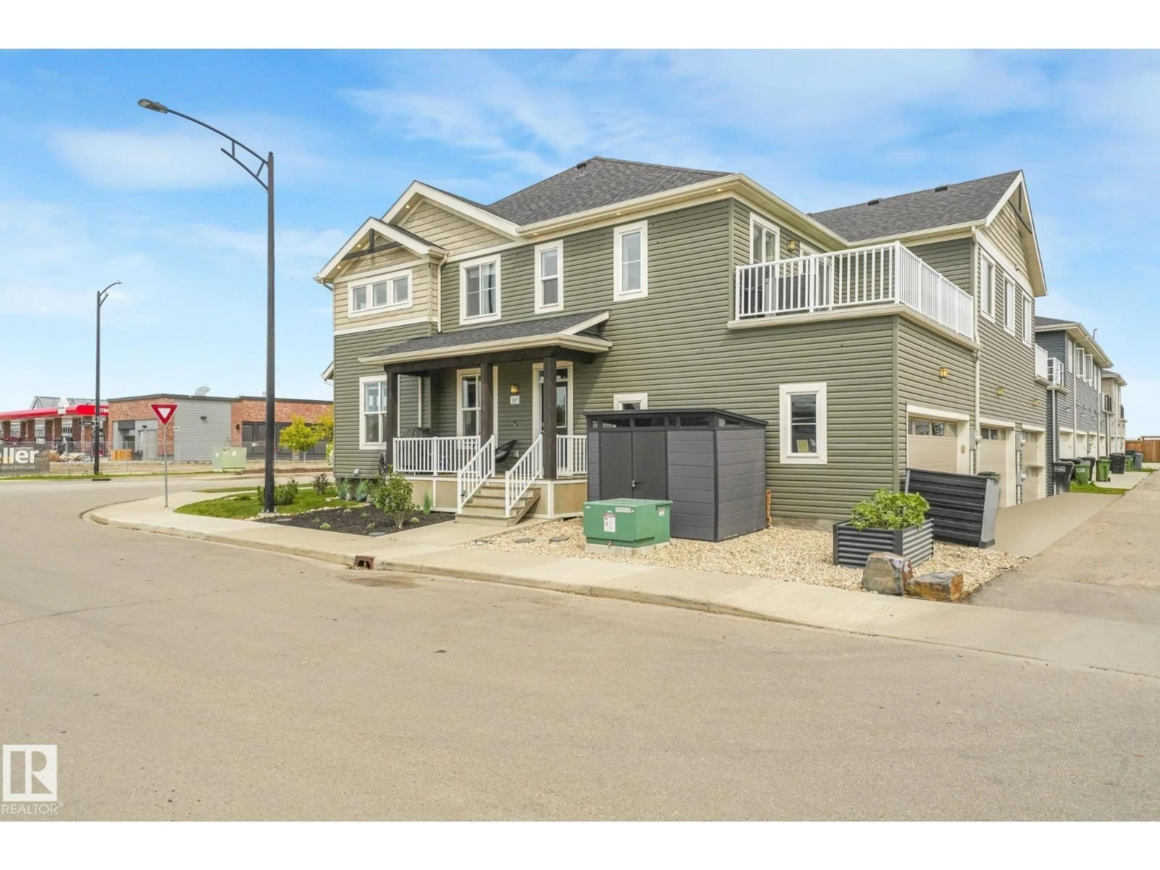 Home with vinyl exterior material, street for NW - 2027 201 ST, Edmonton Alberta T6M0X6