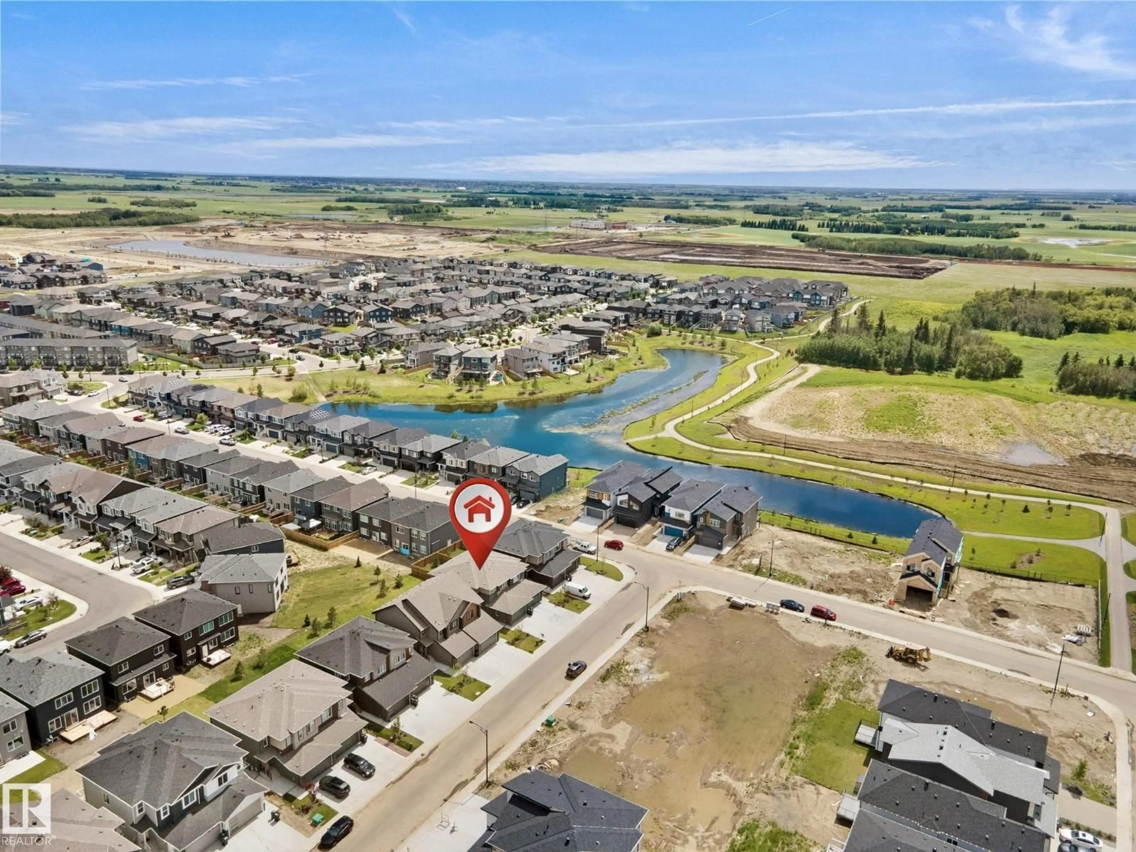 A pic from outside/outdoor area/front of a property/back of a property/a pic from drone, water/lake/river/ocean view for 8523 MAYDAY RUN SW, Edmonton Alberta T6X3E9
